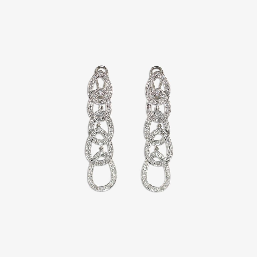 Ladies 14k white gold and diamond necklace and earring set.
Stamped 14k, 585, and weighs 11.1 grams.
There are small round brilliant cut diamonds, .50 total carat weight, i to j color, i1 clarity.
The snake chain measures 19 inches long and the