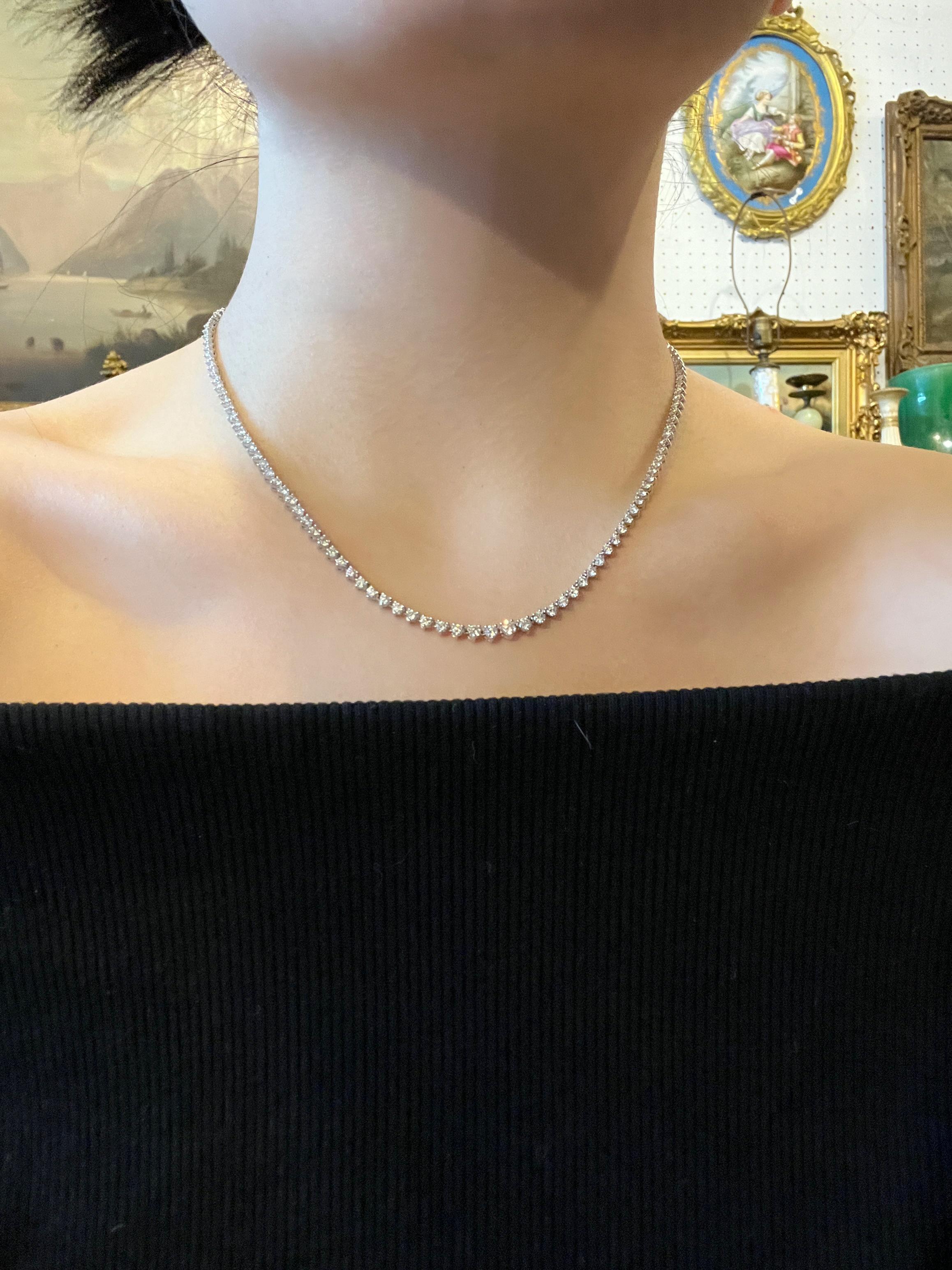14K White Gold Diamond Necklace

Marked:
14K

Approximate Dimensions: 
42.7 cm (Unclasped Length) 
0.3 cm (Width) 
Approx. 5 carats (+/-) Diamond) 
14.8 grams in weight.