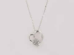 Collana con ciondolo a forma di cuore aperto con diamanti in oro bianco 14 carati