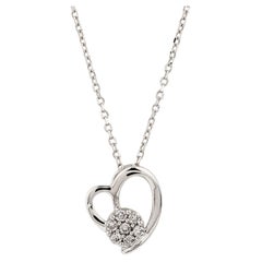 Collana con ciondolo a forma di cuore aperto con diamanti in oro bianco 14 carati