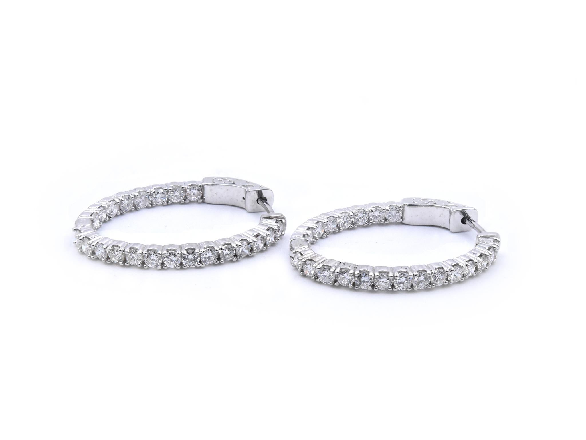 Designer: custom
Material: 14k white gold
Diamonds: 44 round brilliant cuts = 2.25cttw
Color: G-I
Clarity: VS2-SI1
Dimensions: earrings measure 28.90mm x 22.50mm
Fastenings: lever lock
Weight: 6.6 grams