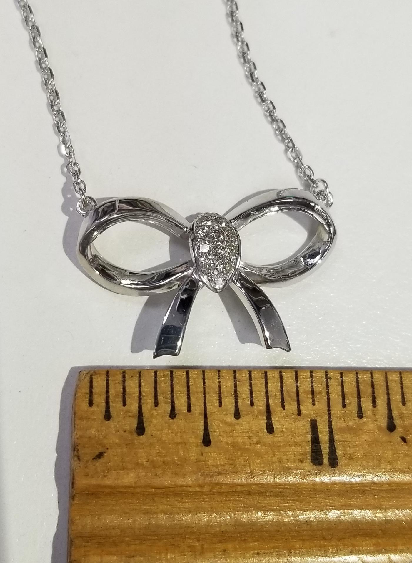 white gold bow necklace