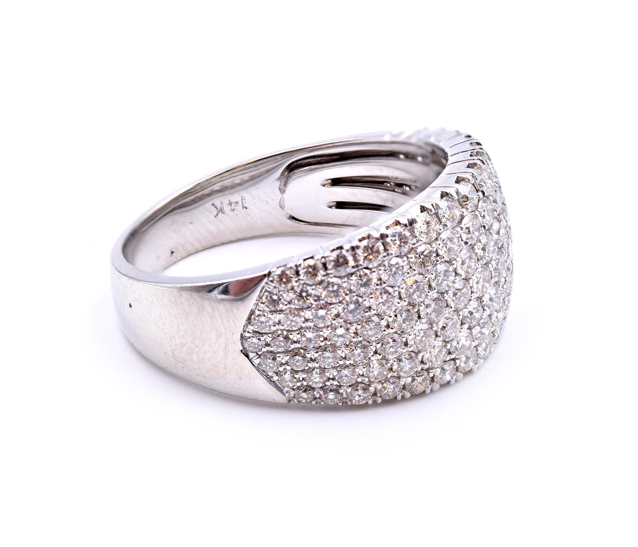 Designer: custom design
Material: 14k white gold
Diamonds: 121 brilliant cuts = 2.00cttw
Color: G
Clarity: VS
Ring size: 9 (please allow two additional shipping days for sizing requests)
Dimensions: ring measures 11.60mm
Weight: 10.58 grams 
