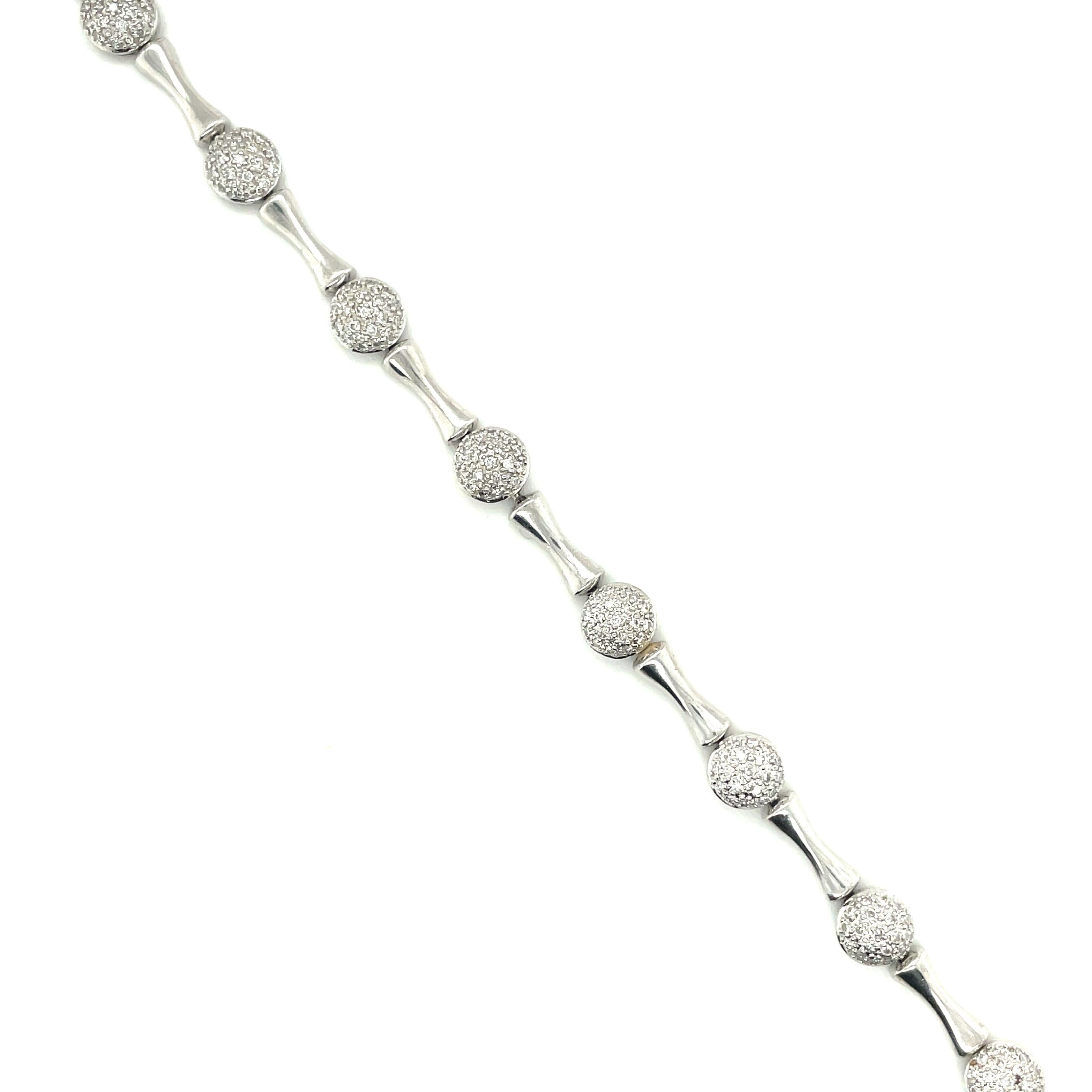 14K White Gold Diamond Pave Link Bracelet

Grams 10.2