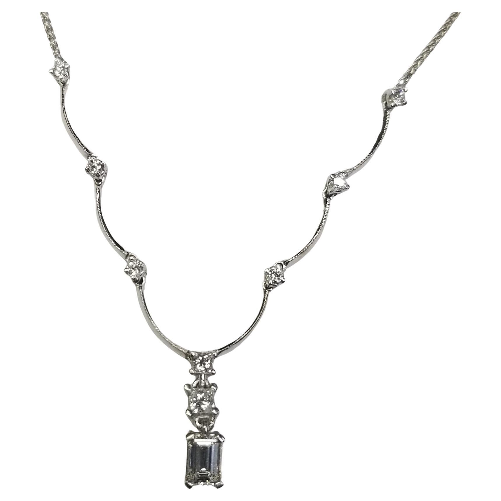 14k White Gold Diamond pendant weighing .50pts.