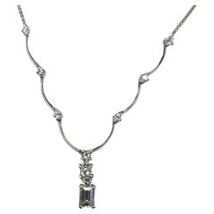 14k White Gold Diamond pendant weighing .50pts.
