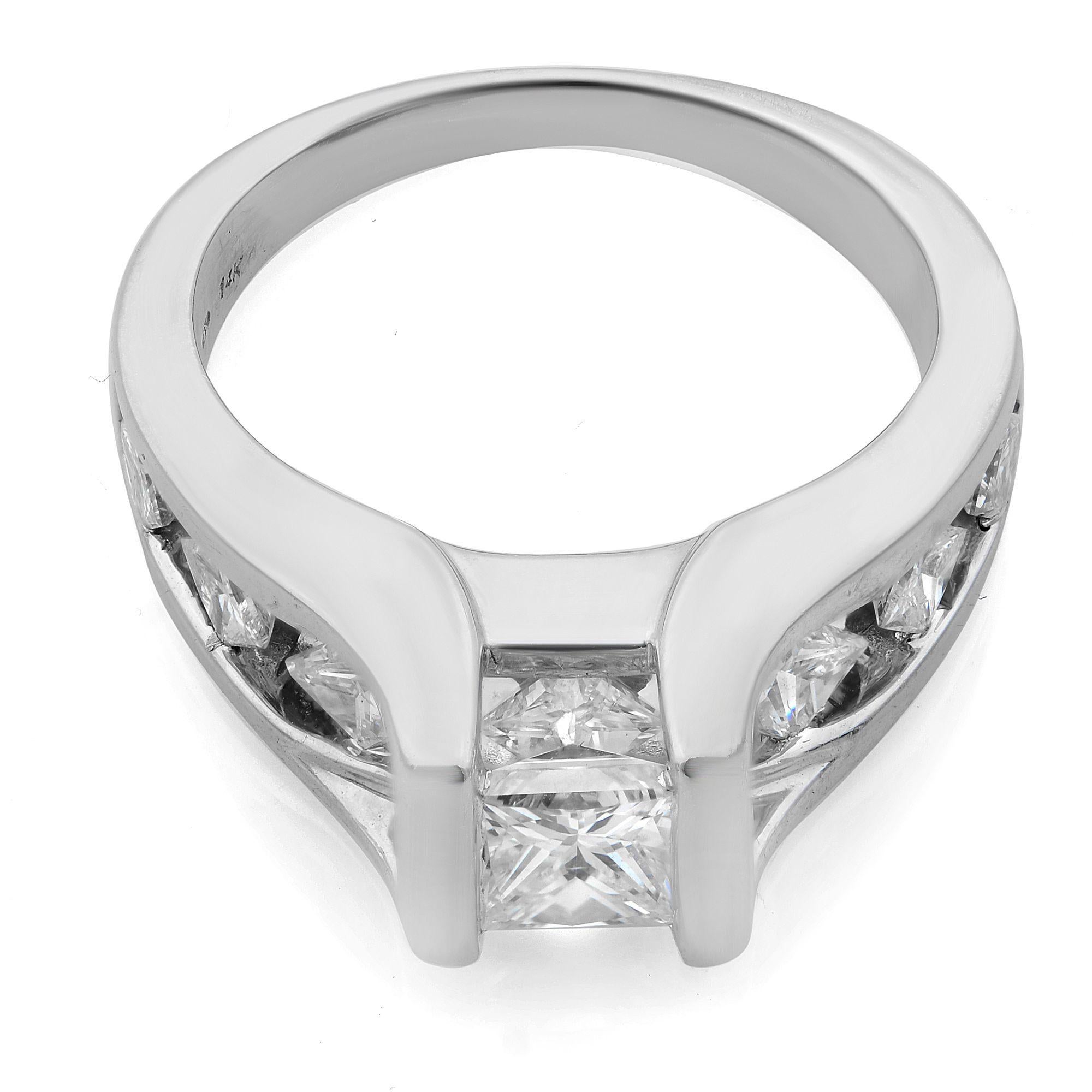 This ring is new and comes with a gift box and appraisal card. It's made of 14K white gold. Center stone: apprx. 1.01 cttw princess cut diamond; accents stones: 7 princess cut white diamonds of appx. 1.6 cttw. Total 2.61 Cttw. Size of the ring is 7,