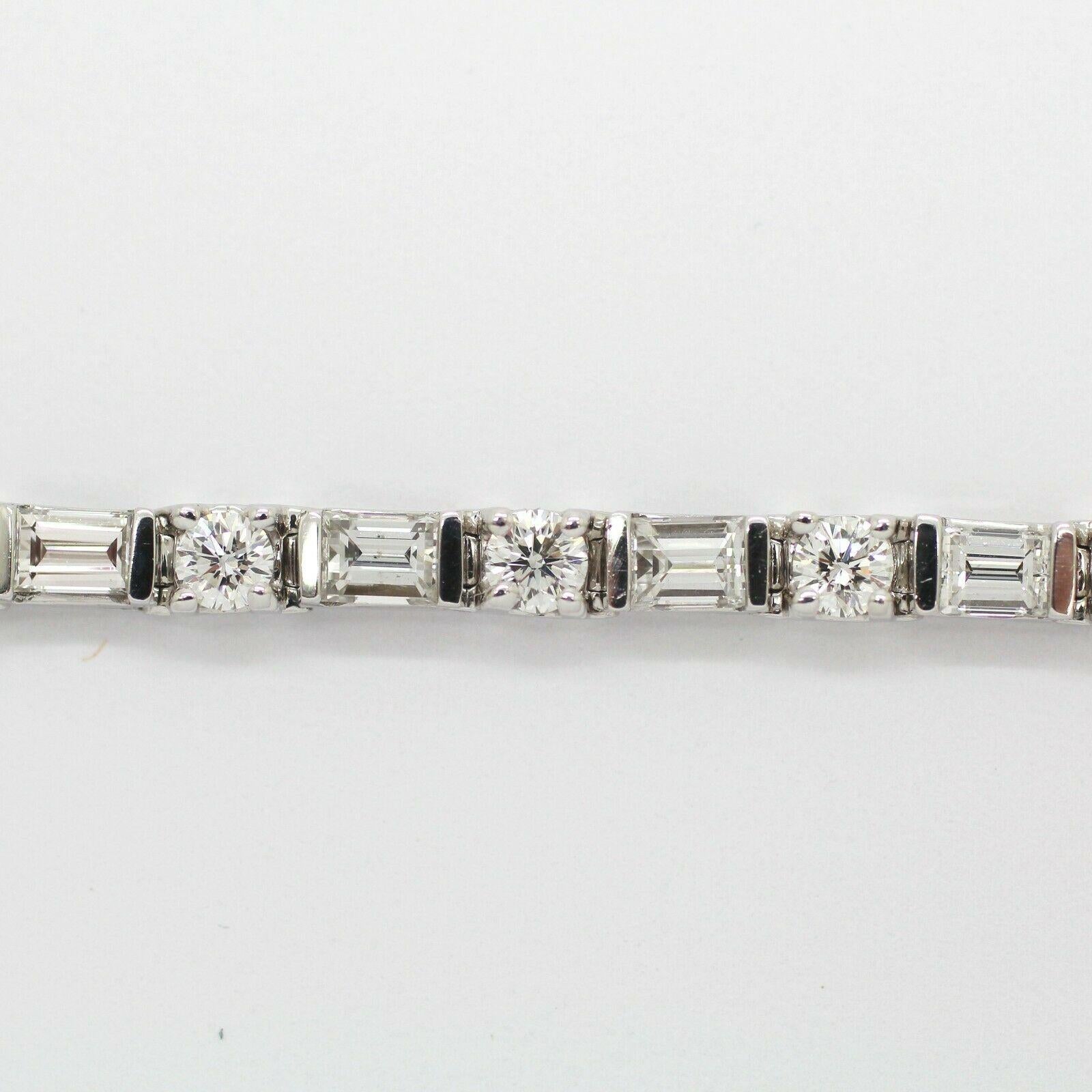 DIAMOND TENNIS BRACELET 
Specifications:
    main stone:ROUND AND BAGUETTES DIAMONDS
    diamonds:38 PCS
    carat total weight:5.09 CTW
    color:G
    clarity:VS
    THICKNESS:  3.14  mm
    WIDTH:  3.37  MM
    brand:CUSTOM MADE
    metal:14K