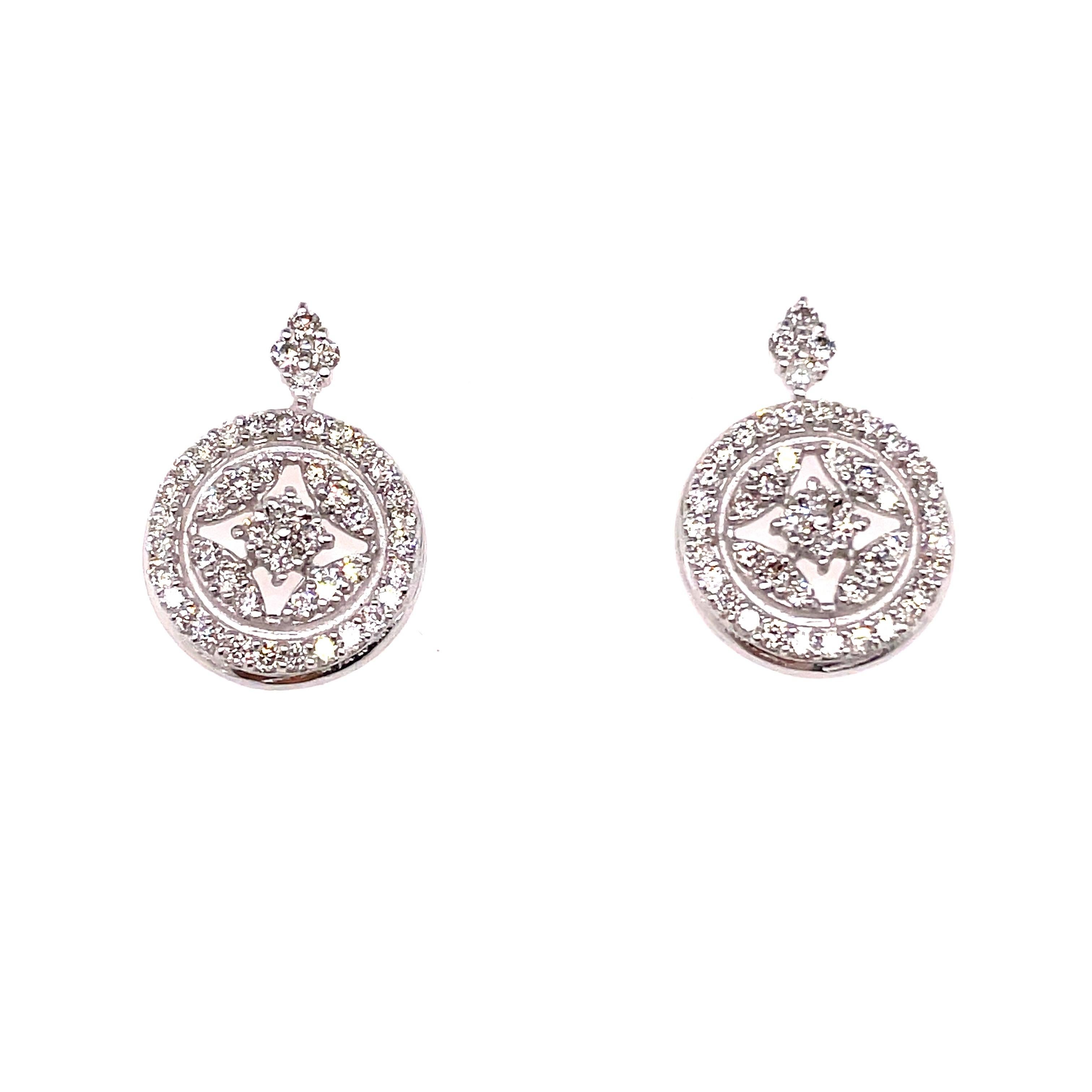 14k White Gold Diamond Round Pave Diamond Earrings, 1.34 Cts

The meticulously crafted diamond-shaped design, adorned with a round pave of exquisite diamonds, that envelops it creates a mesmerizing play of brilliance, capturing the essence of