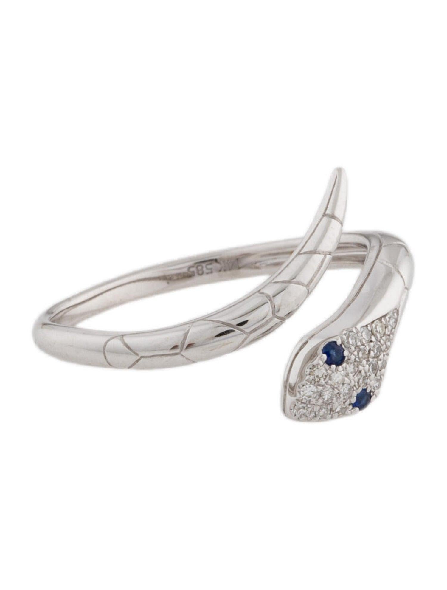 This Stunning and Charismatic Snake ring is crafted of 14K Gold and features approximately 0.06 ct. of Diamonds and 2 blue sapphires approximately 0.02 ct. Available in your choice of Yellow, Rose or White Gold. Wraps Gracefully around your finger