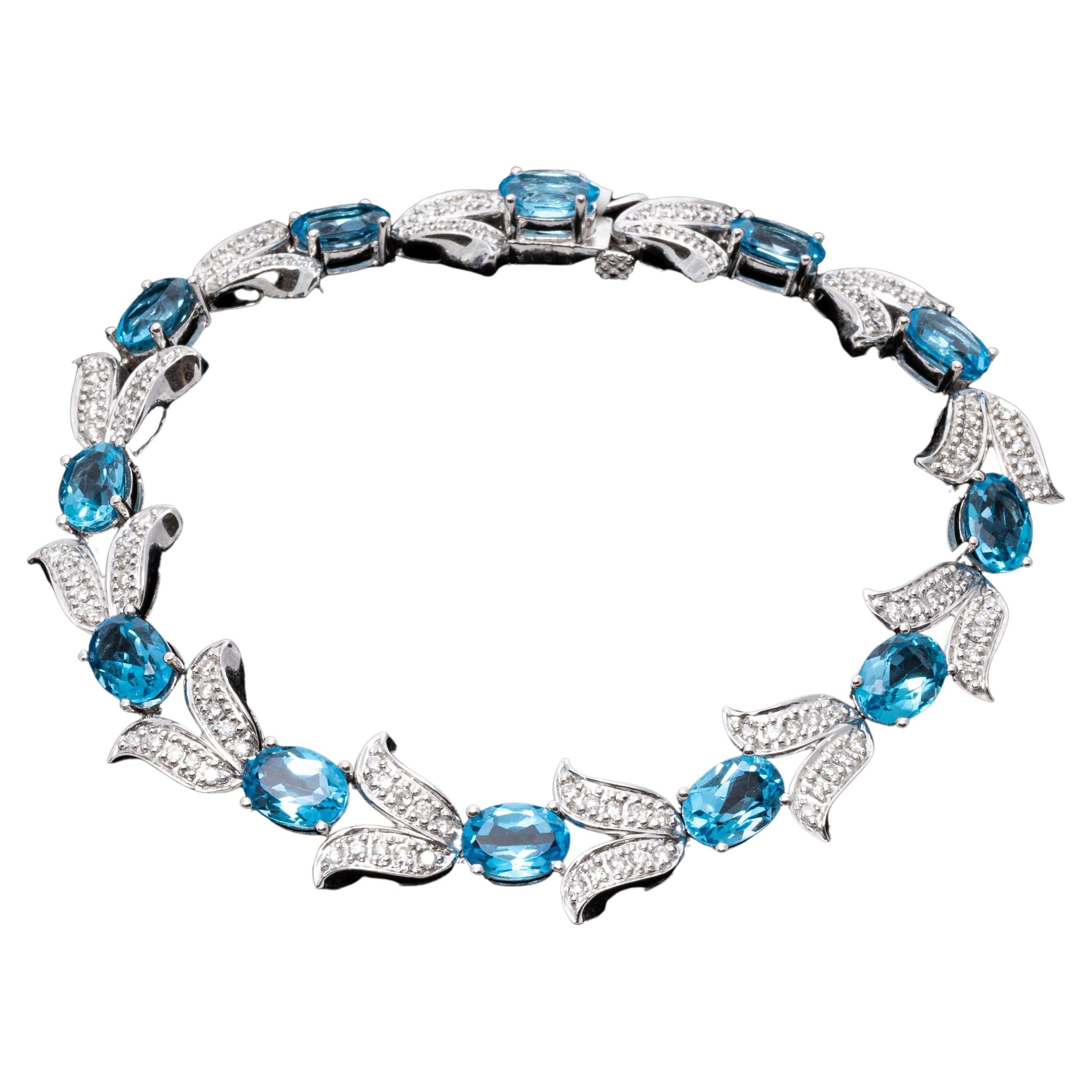 14k White Gold Diamond Set Tulip And Blue Topaz Link Bracelet