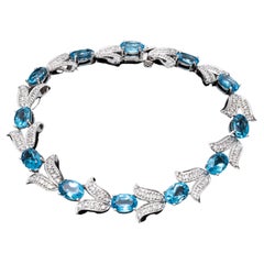 14k White Gold Diamond Set Tulip And Blue Topaz Link Bracelet