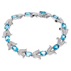 14k White Gold Diamond Set Tulip And Blue Topaz Link Bracelet