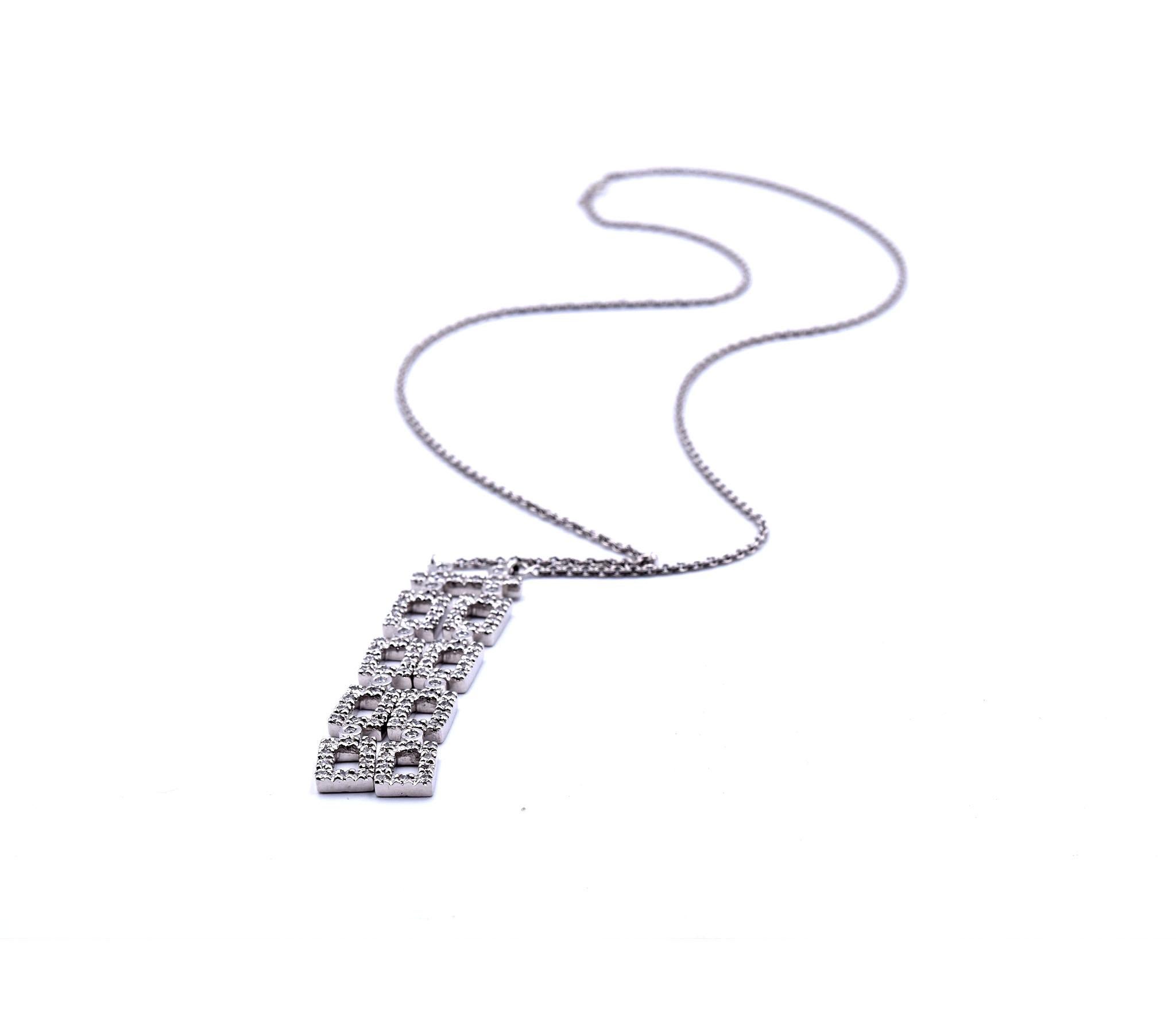 Designer: custom designed
Material: 14k white gold
Diamonds: 96 round brilliant cut= 1.44cttw 
Color: G
Clarity: VS
Dimensions: necklace is 18-inches long and square drop  is 2-inches long and 13.25mm wide
Weight: 13.02 grams
