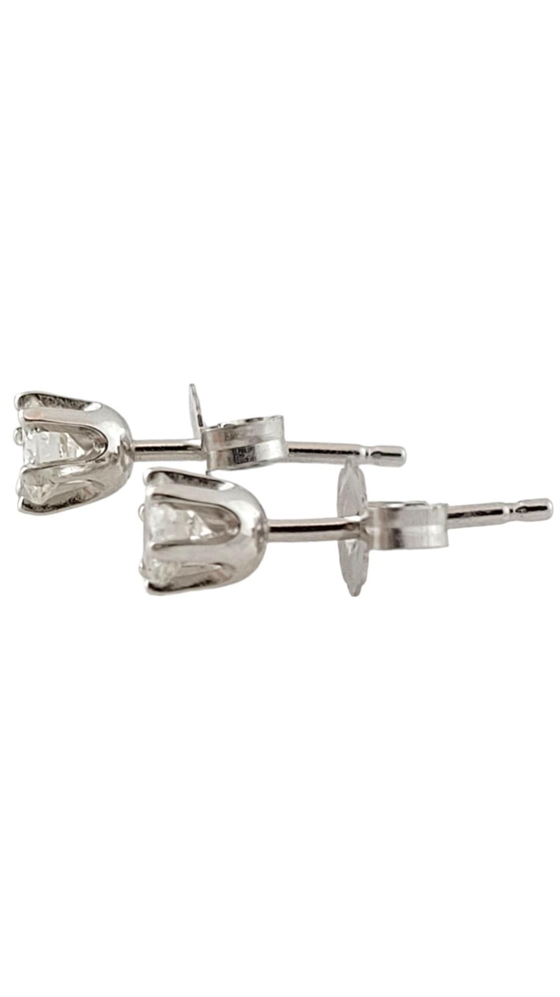 14K White Gold Diamond Stud Earrings

These simple but gorgeous stud earrings have 2 sparkling round brilliant cut diamonds!

Approximate total diamond weight: .34 - .36 cts

Diamond color: H-I

Diamond clarity: SI1

Size: 13mm x 4mm

Weight: 0.4