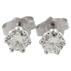 Clous d'oreilles en or blanc 14 carats et diamants n°16429