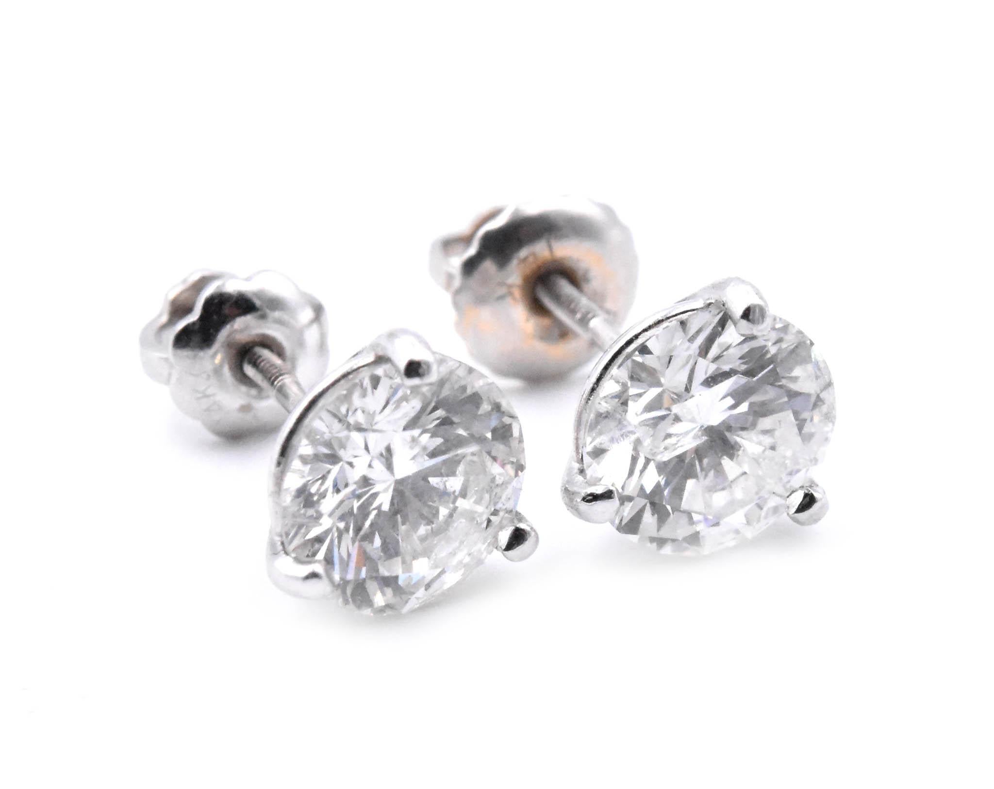 Material: 14k white gold
Diamonds: 2 round brilliant cut = 2.30cttw
Color: I
Clarity: SI3
Dimensions: earrings measure approximately 15mm x 6mm
Fastenings: post with screw backs
Weight:  1.58 grams

