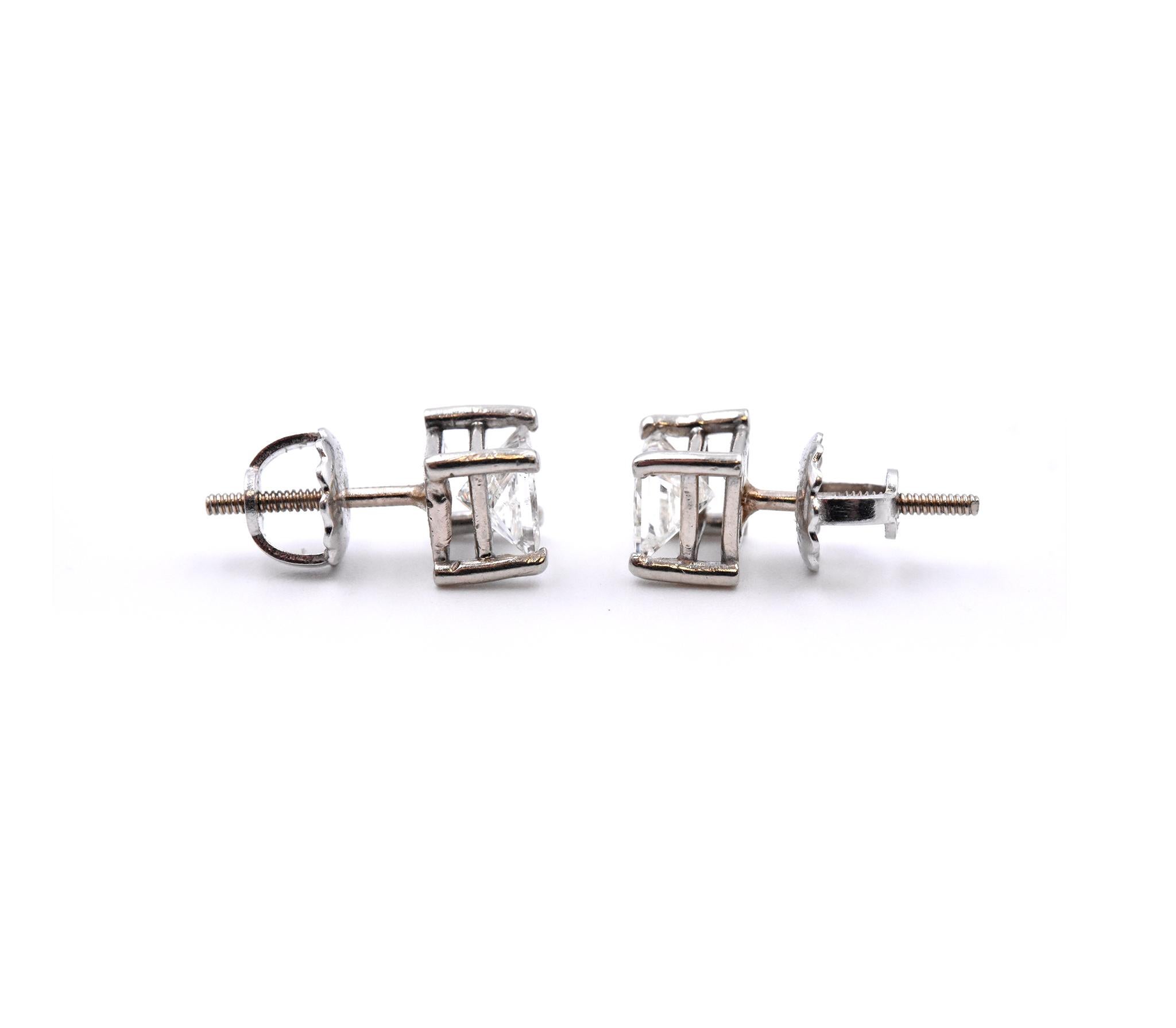 Material: 14k white gold
Diamonds: 2 princess cuts = 1.10cttw
Color: G-H
Clarity: SI1
Dimensions: earrings measure approximately 5.8mm x 5.8mm
Fastenings: post with screw backs
Weight:  1.42 grams