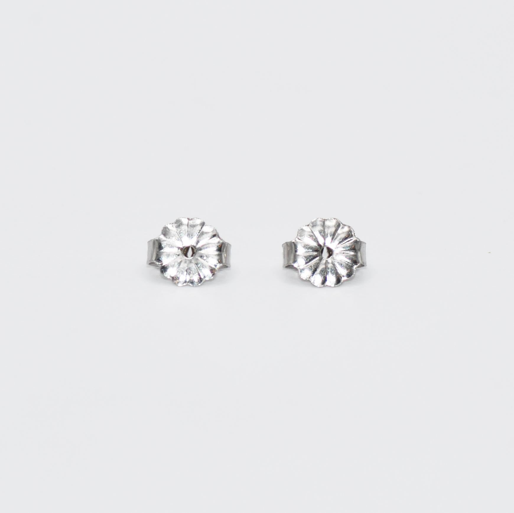 14K White Gold Diamond Studs, .90tdw, 1g
Diamond stud earrings in 14k white gold mountings.
The mountings are new and stamped 14k.
The diamonds are round brilliant cuts, .90 total carats, H to i color, Si clarity, good to very good cuts.
Posts with