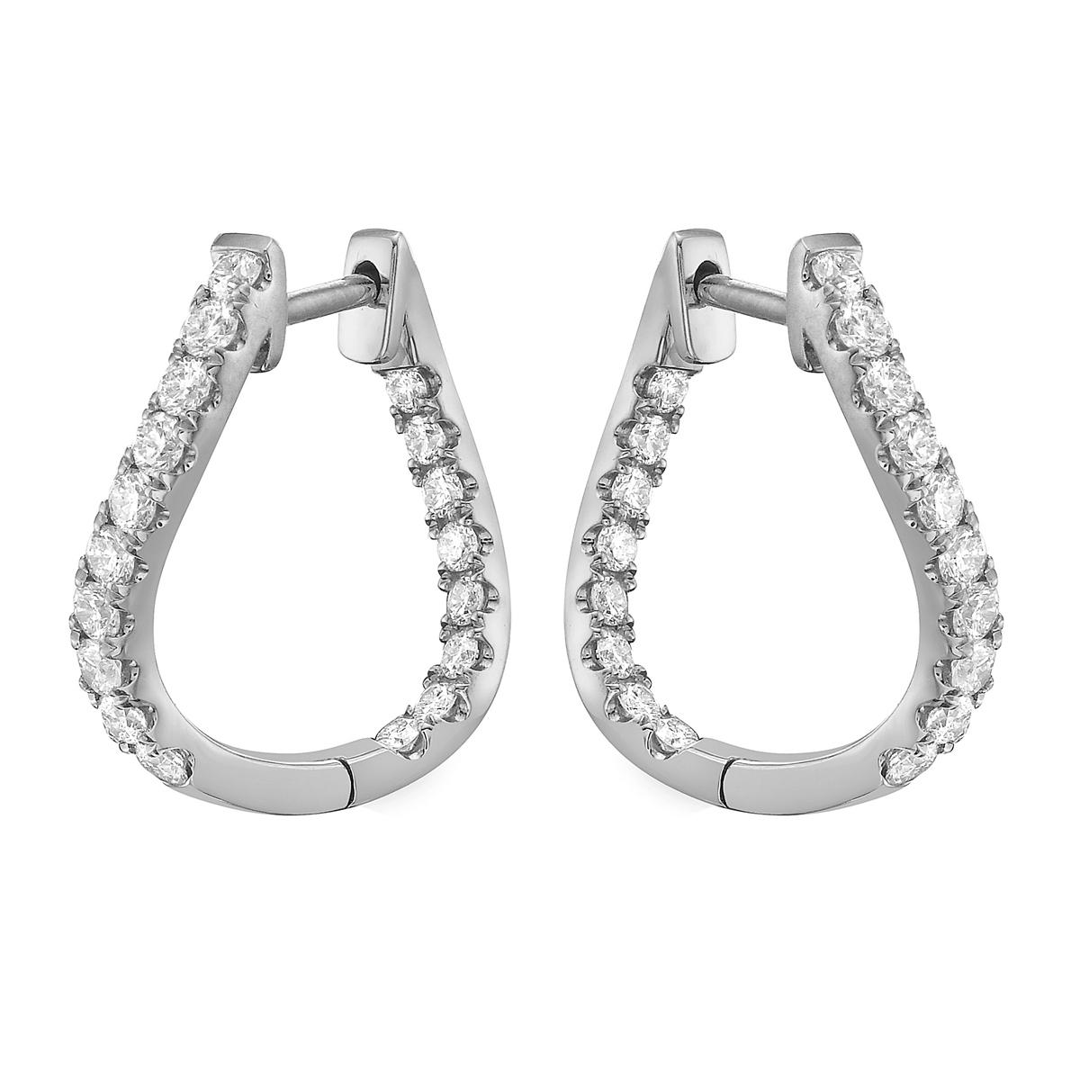 These 14K White Gold Diamond Swish Hoop Earrings are the perfect mix of elegance and shine. Made from 3.2 grams of solid white gold, they are lightweight and comfortable to wear all day. The unique swish design adds a modern touch, making them stand