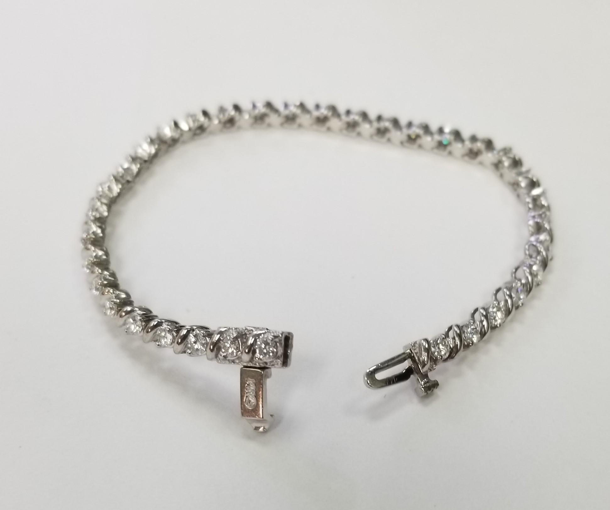 Specifications:
Metal: 14K White Gold
Weight: 13 Gr
Length: 7 inch
Carat Total Weight: 34 Diamonds  3.50 CTW
Color: F-G
Clarity:VS1
with very strong double clasp