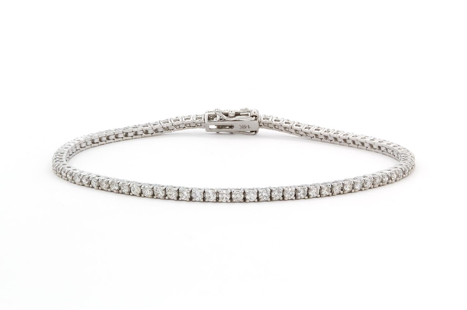We are pleased to present this beautiful Brand New 14k White Gold & Diamond Tennis Bracelet. It features 2.06ctw G-H/VS2-SI1 Round Brilliant Cut Diamonds set in this 14k white gold tennis bracelet. The bracelet measures 7″ long and features a push