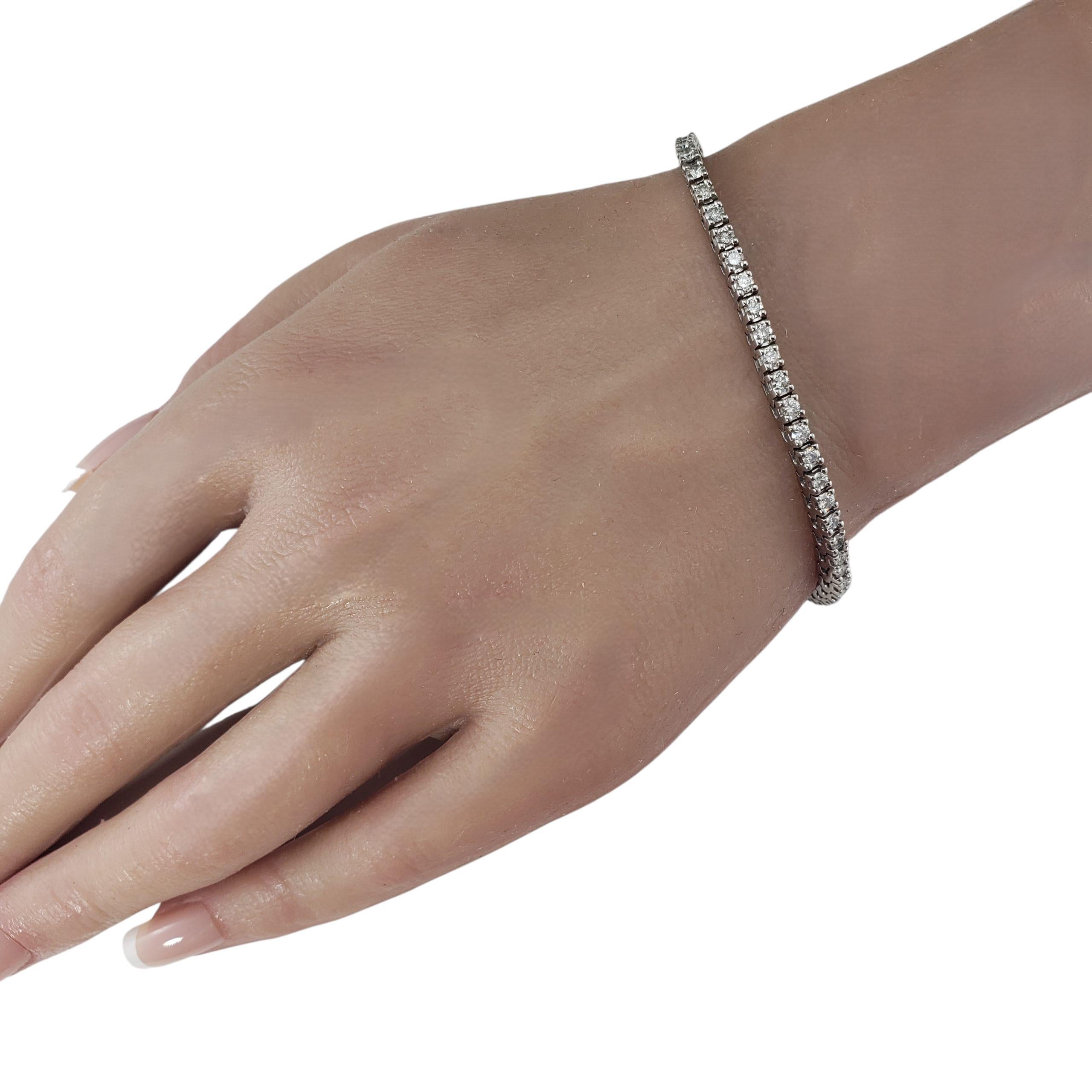 Pulsera de tenis con diamantes de oro blanco de 14 quilates #22999 en venta 2