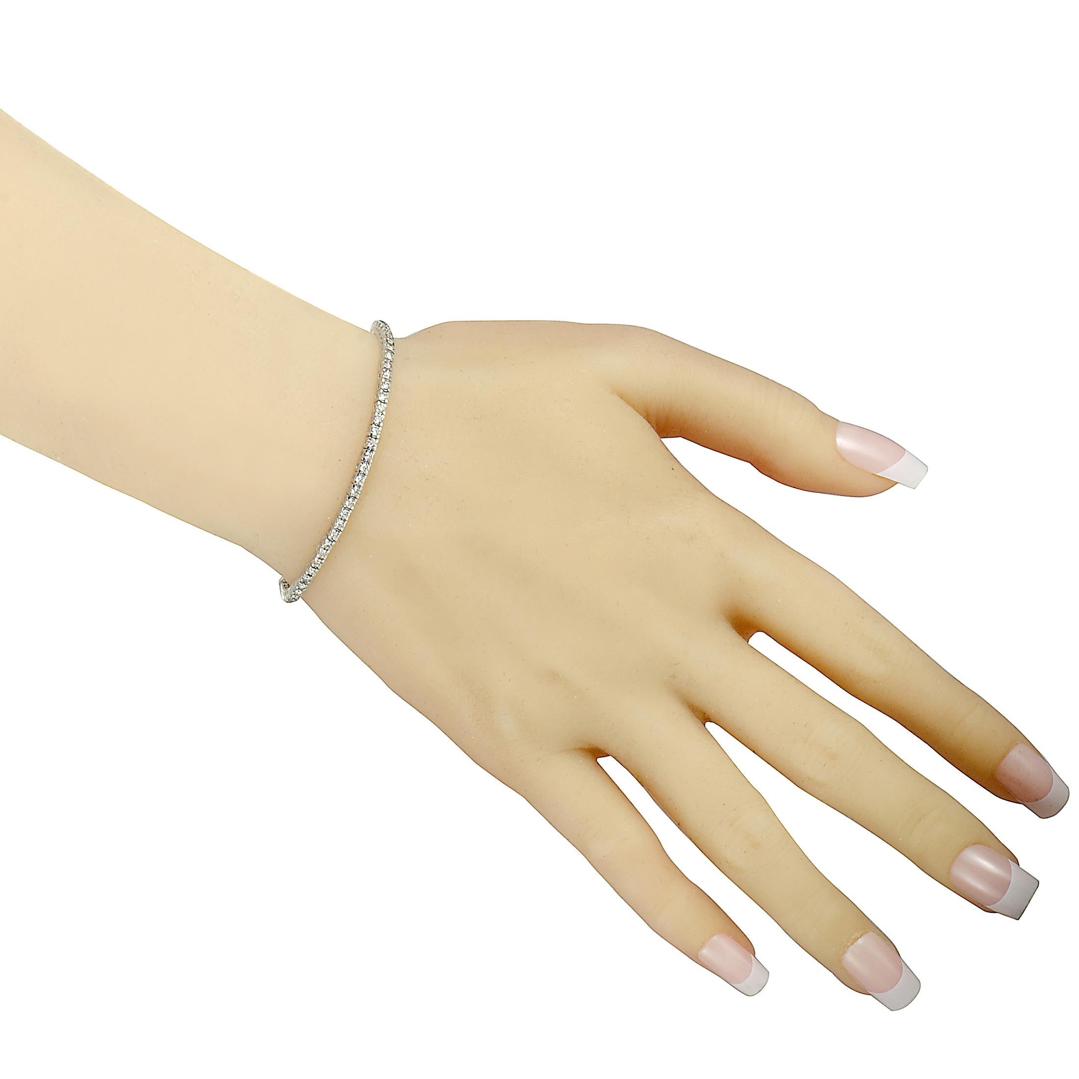 This bracelet is made out of 14K white gold and diamonds that amount to 1.00 carat. The bracelet weighs 9.4 grams and measures 7.00” in length.
 
 Offered in brand new condition, this item includes a gift box.
