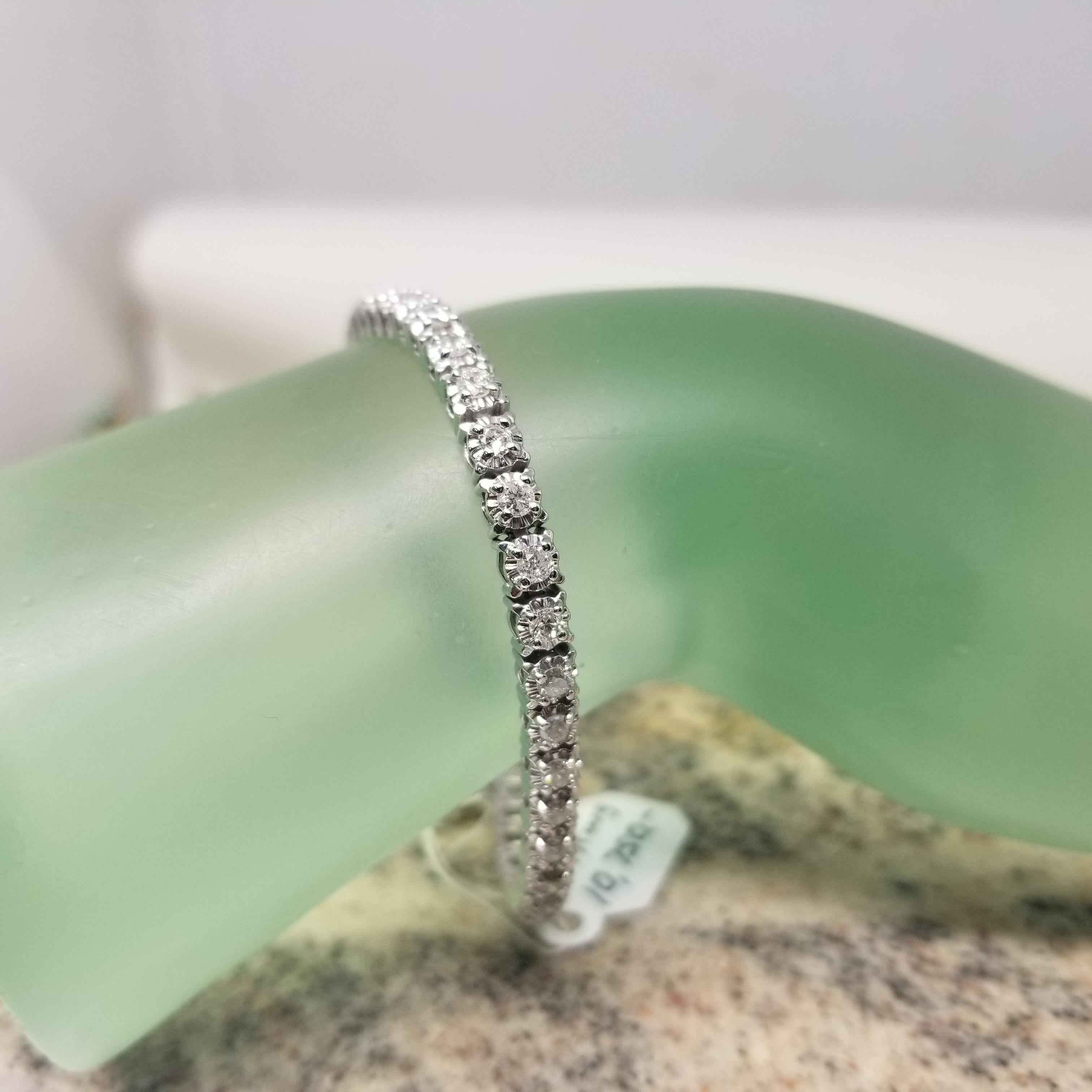 Round Cut 14k White Gold Diamond Tennis Bracelet Set in an Illusion Setting 3.01 Carats For Sale