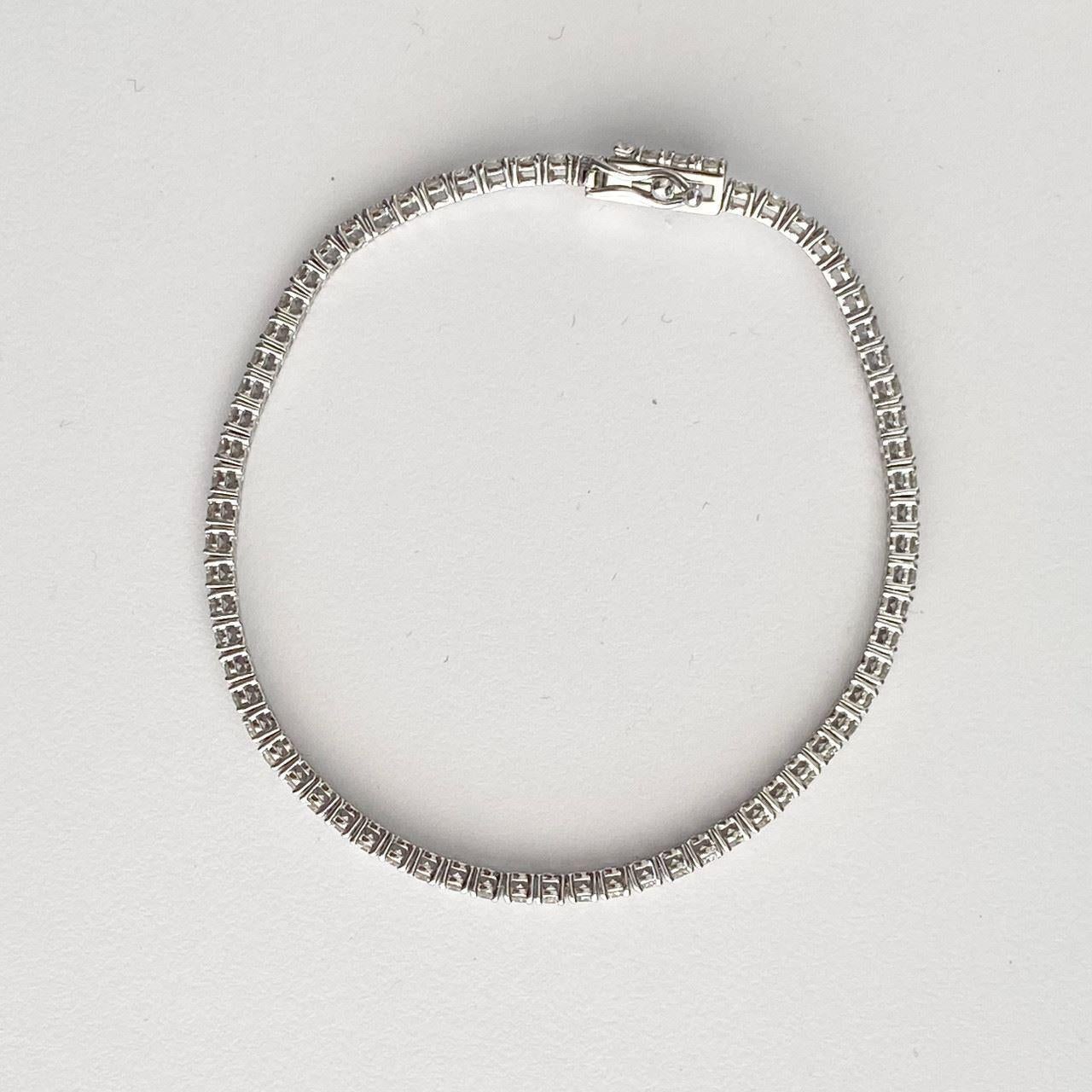 Contemporary 14k White Gold Diamond Tennis Bracelet Weighing 3.65ctw For Sale