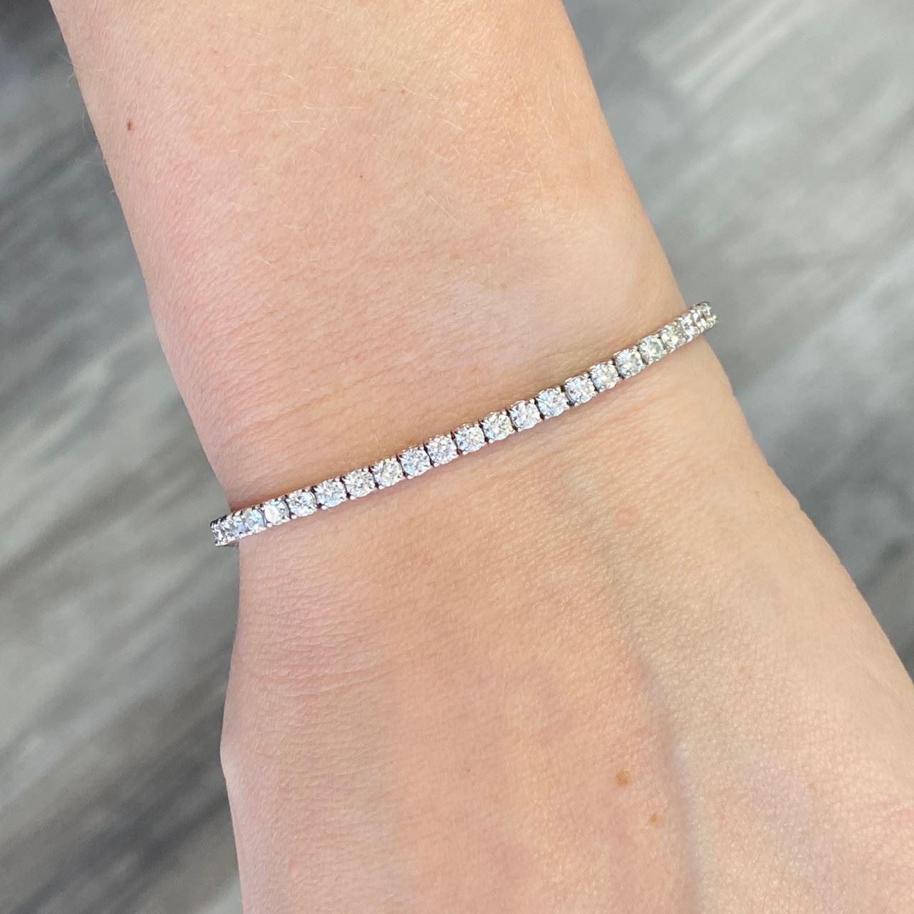 Contemporary 14k White Gold Diamond Tennis Bracelet Weighing 3.93ctw For Sale