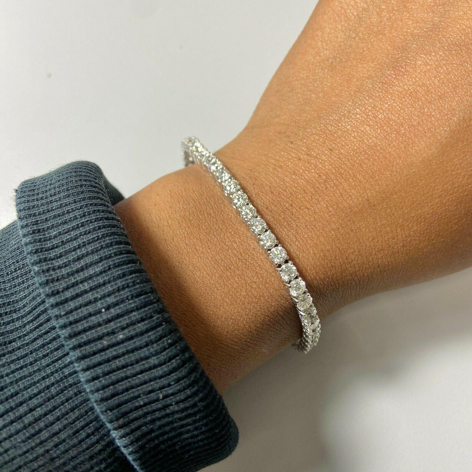 Specifications:
    main stone:ROUND DIAMONDS
    diamonds:47 PCS
    carat total weight:approximately 8.67 CTW
    color:H
    clarity:VS
    brand:CUSTOM MADE
    metal:14K WHITE gold
    type:BRACELET
    weight:9.30 gr
    LENGHT:7 INCH
   
