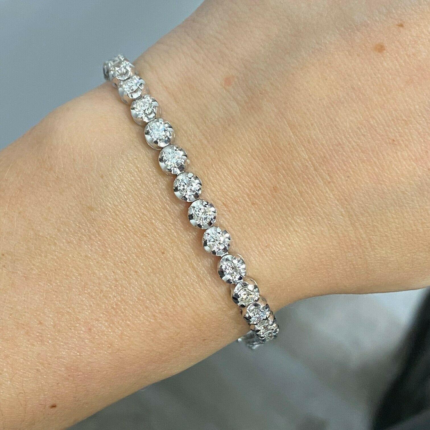 Contemporary 14k White Gold Diamond Tennis Illusion Setting Bracelet Weighing 4.35 Ctw For Sale