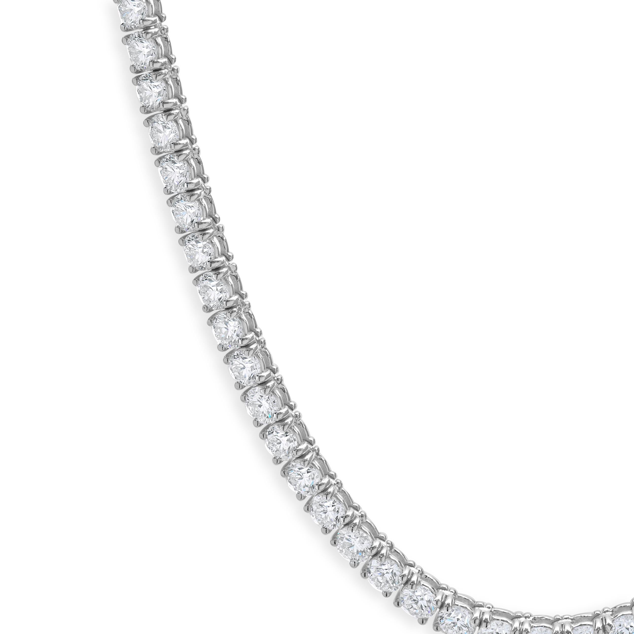 Designer: custom
Material: 14K white gold
Diamonds: round brilliant cut = 18.96ct
Color: F/G
Clarity: SI1-2
Dimensions: necklace measures 16-inches in length
Weight: 22.13 grams
