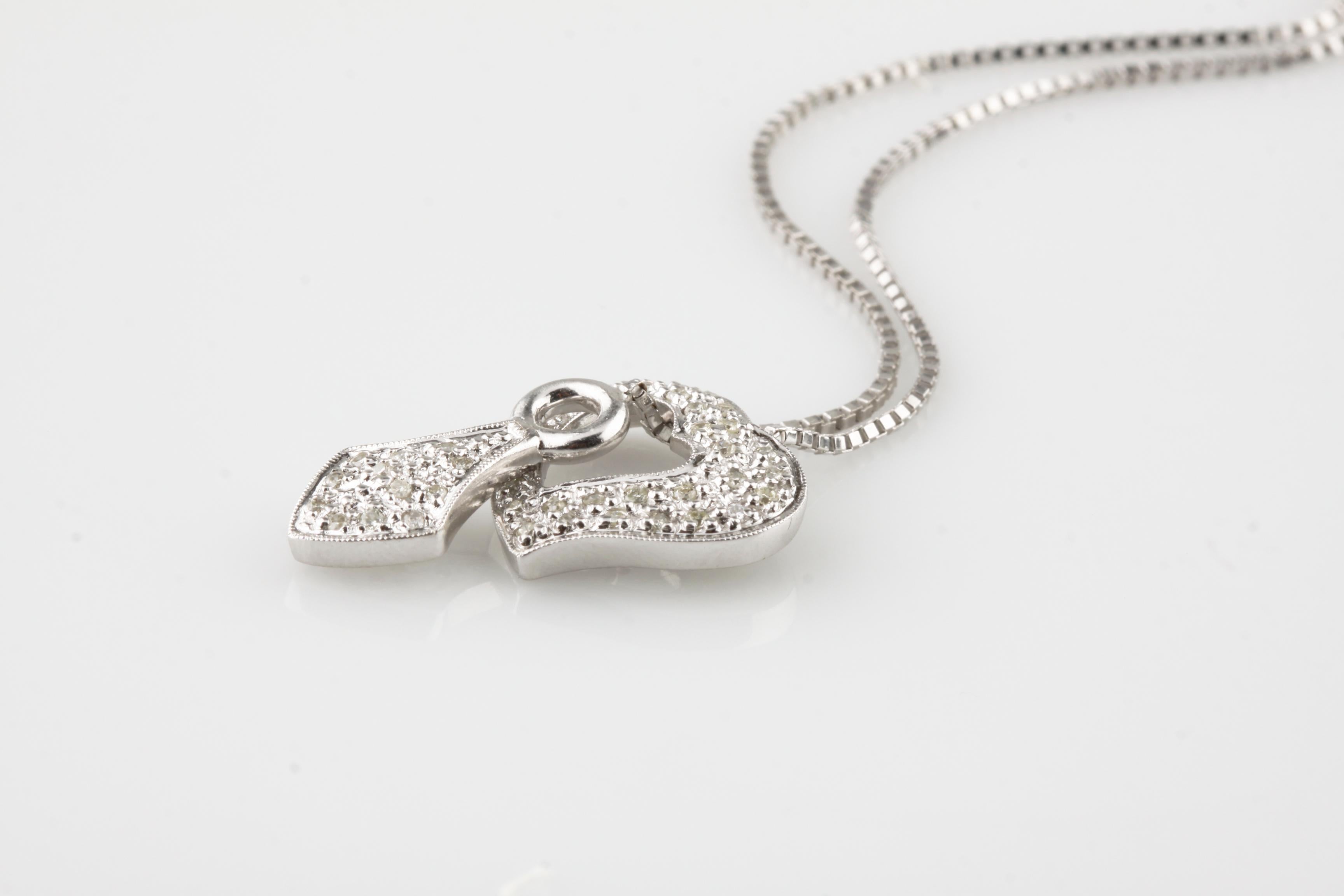 Gorgeous, Unique Lariat Necklace Featuring Asymmetrical Heart & Drop
Both Are Covered in Round Cut Pavé Diamonds
Heart is 16 mm Wide x 15 mm Long
Drop is 8 mm Wide and 18 mm Long (Including Bail)
TDW = Approximately 0.22 ct
Average Color = K -
