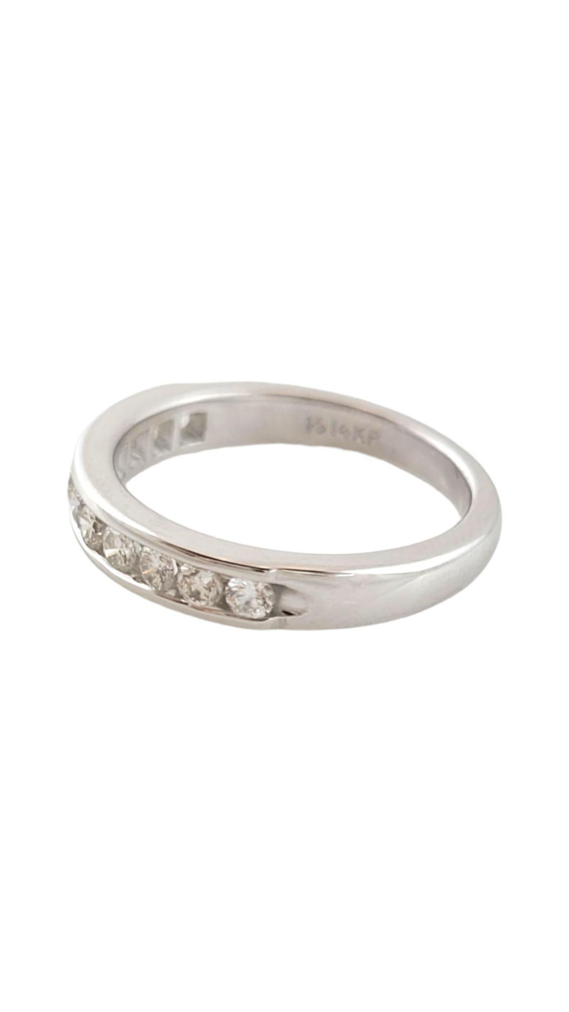 Gorgeous 14K white gold wedding band with 11 sparkling, round cut channel set diamonds!

Approximate total diamond weight: 0.44 cts

Diamond clarity: VS1-VS2

Diamond color: G-H

Shank: 2.6mm

Weight: 3.84 g/ 2.5 dwt

Hallmark: 14KP

Very good