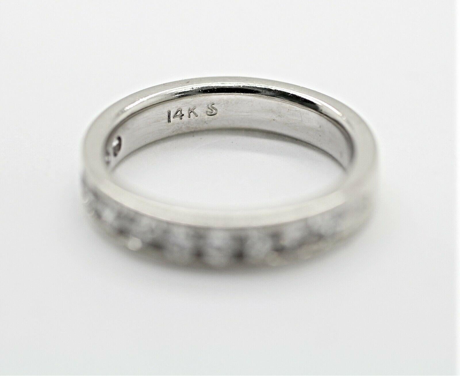 Modern 14 Karat White Gold Diamond Wedding Ring For Sale