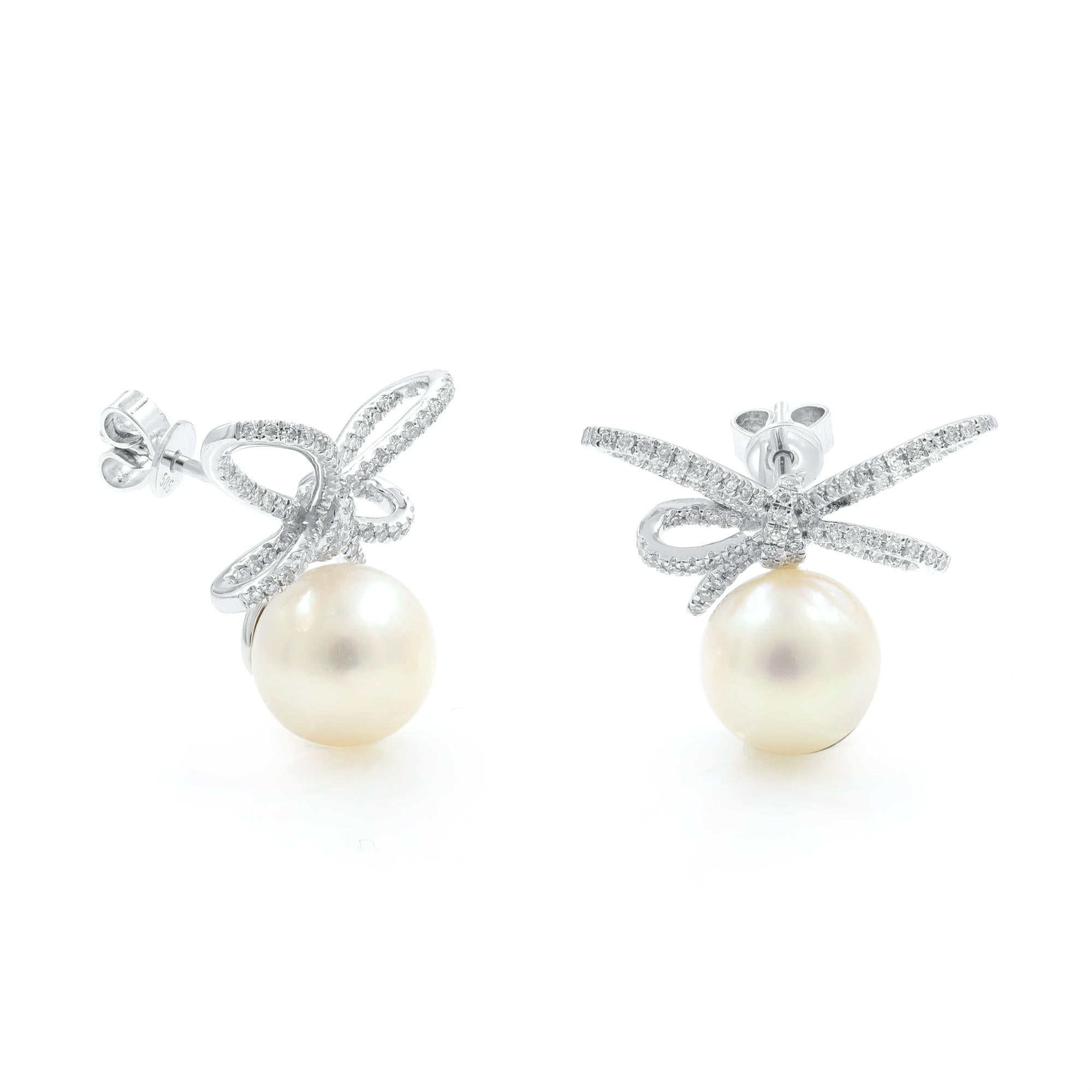 Brand new trendy jewelry with real gold real diamonds!
This beautiful pearl earrings are crafted in 14K White Gold. The stud features a single freshwater pearl and a pave diamond bow totaling in 0.47 carat. This earrings brings a beautiful twist to