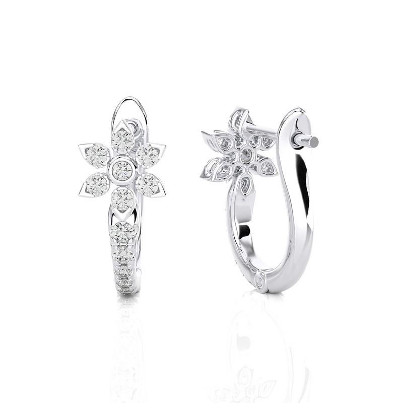 14K White Gold Diamonds Huggie Earring -0.35 CTW
A stellar fusion of elegance and allure. This exquisite huggie earring, crafted in romantic whitegold, showcases a singular star-shaped diamond that shimmers with a total carat weight of 0.35 Ct. Each