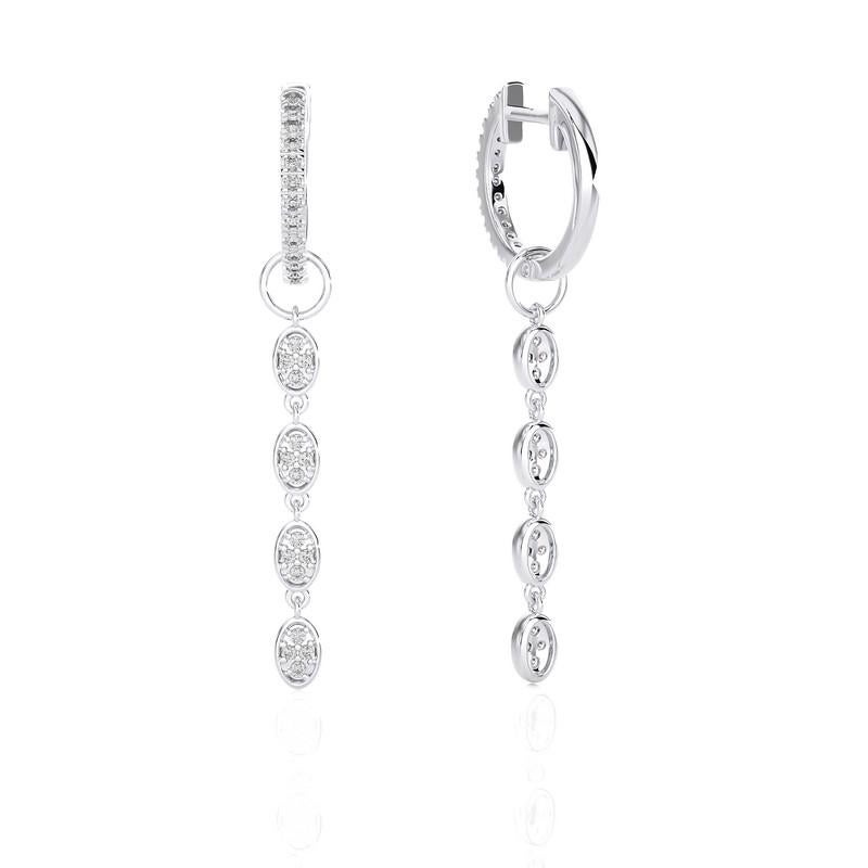 Unveil the epitome of versatility and luxury with our 14K White Gold Diamonds Hoops and Huggie Earring. This extraordinary piece combines the classic allure of hoops with the snug comfort of huggies, adorned with a remarkable 0.37 carats, featuring