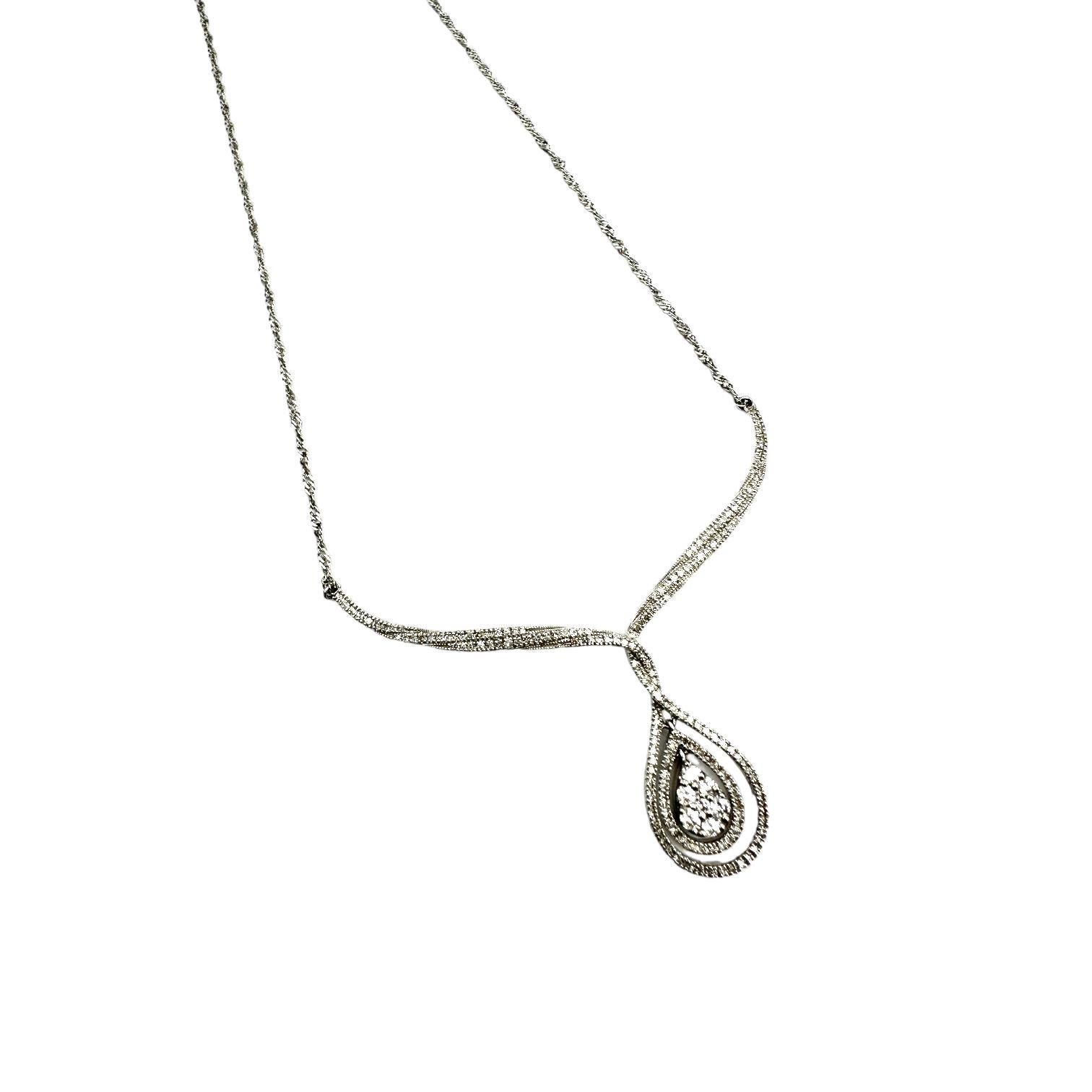 Contemporary, 14-karat white gold “V” shaped pendant necklace with a double halo. Accented surrounding diamonds are set in a halo with a milgrain-setting and attached to a V pave setting. 
The necklace measures three inches wide and two inches long