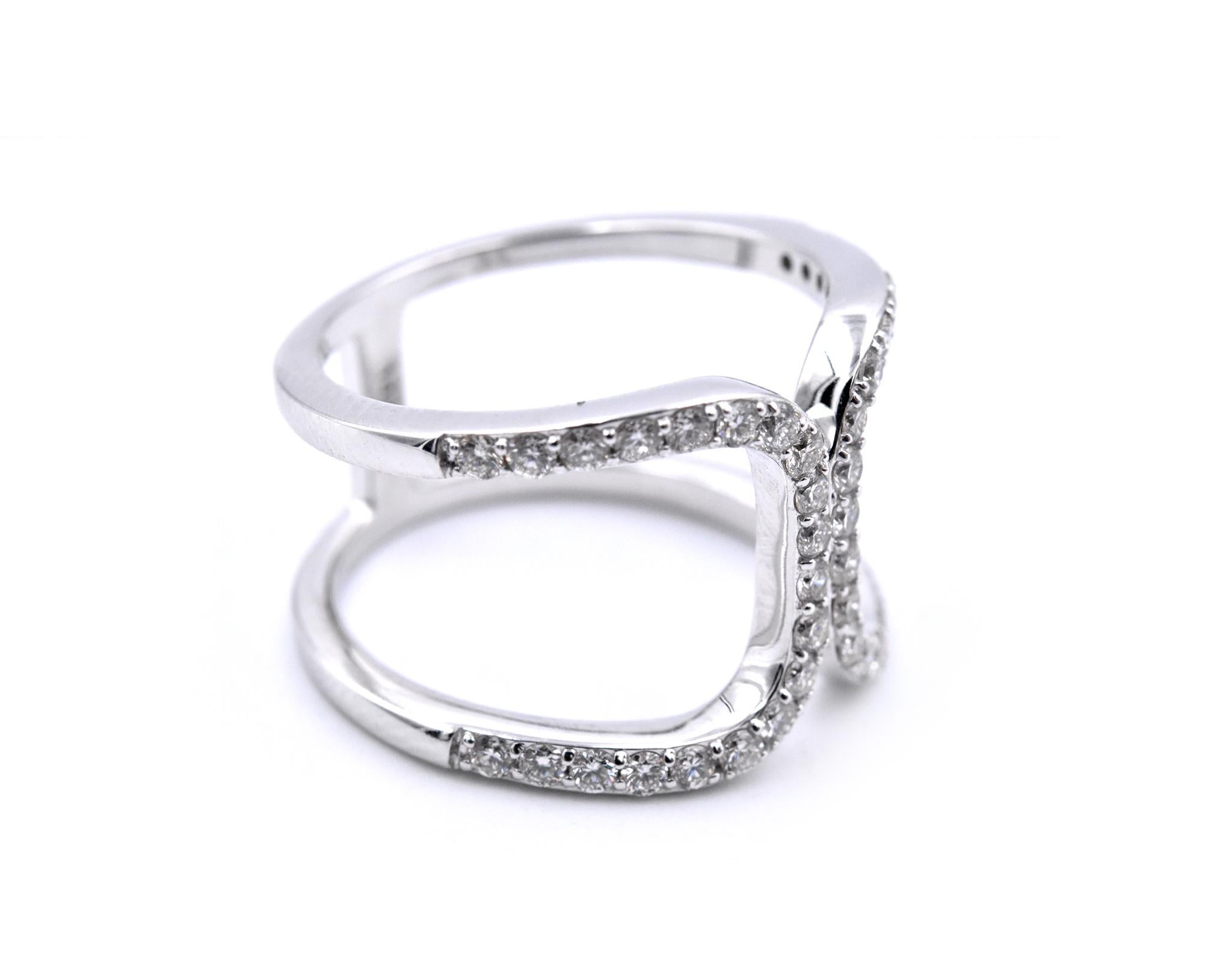 Material: 14k white gold
Diamonds: 40 round brilliant cuts = .75cttw
Color: G-H	
Clarity: VS
Ring size: 8 (please allow two additional shipping days for sizing requests) 
Dimensions: 22.33mm x 14.07mm
Weight: 5.5 4grams 