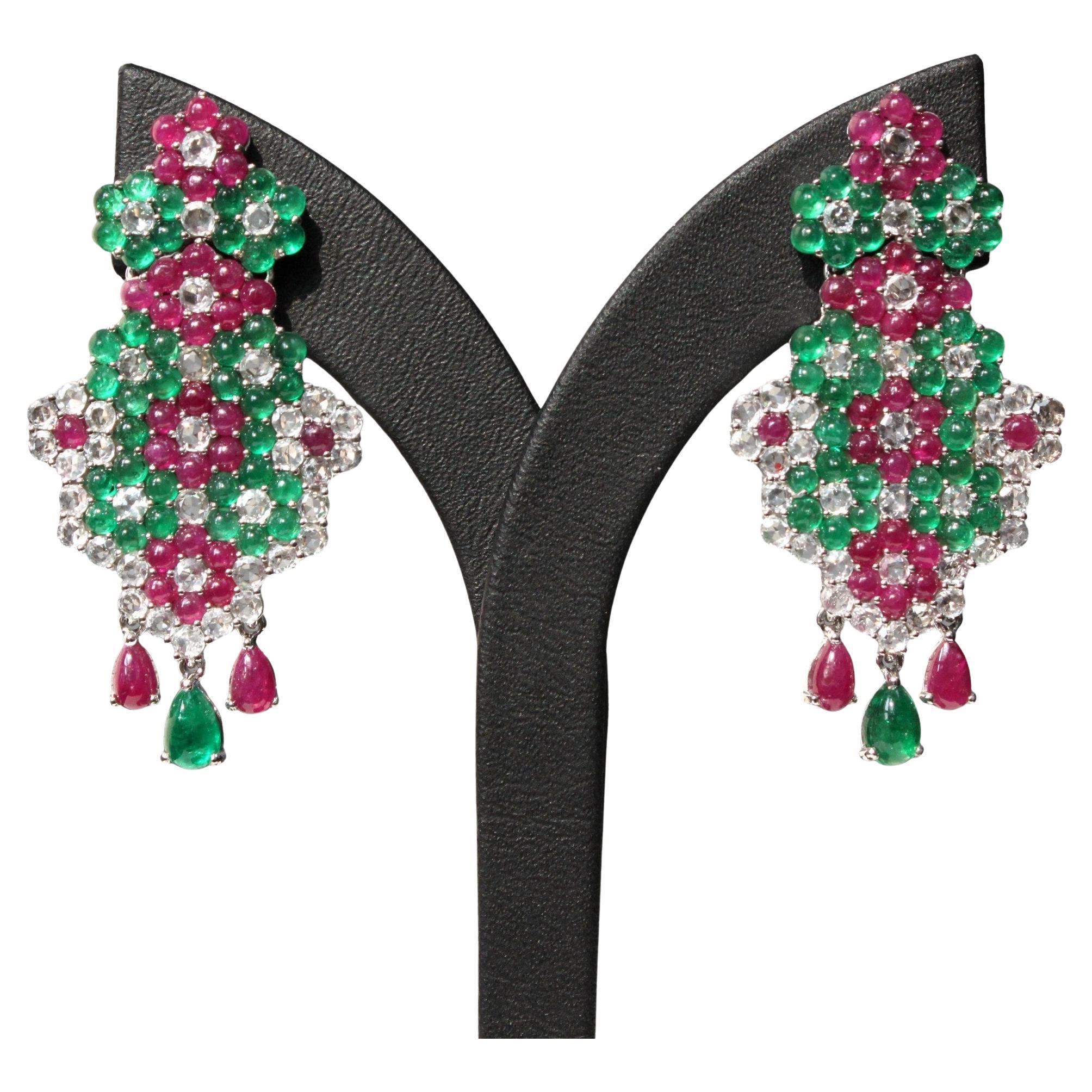 14K white gold earrings adorned with emeralds, rubies, and white sapphires For Sale