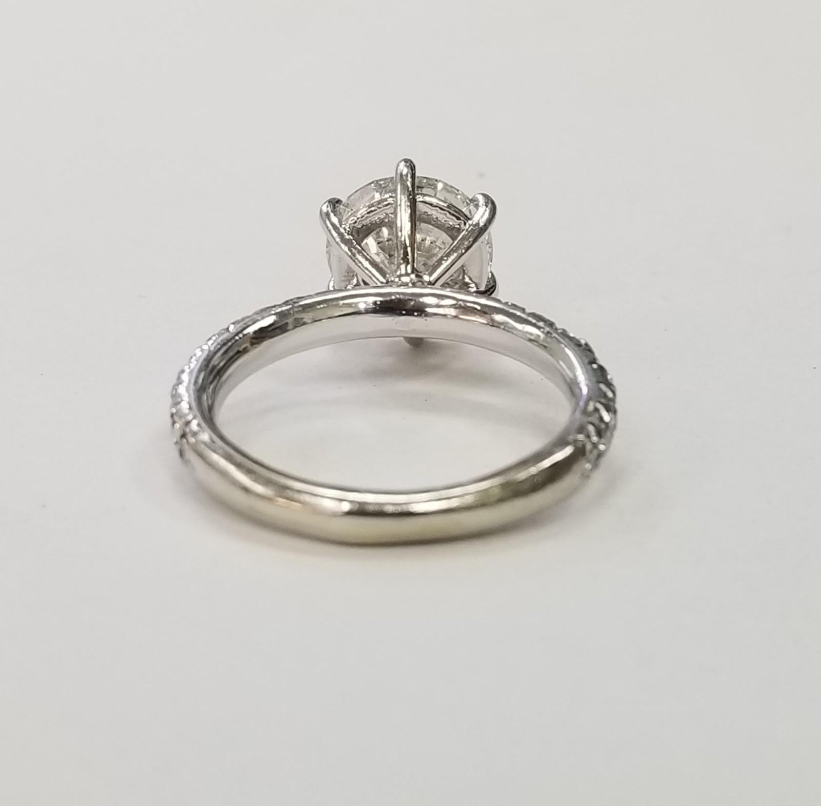 Contemporary EGL Certified F color SI2 clarity Round 3.00 Carat 14k Pave' Diamond Ring For Sale