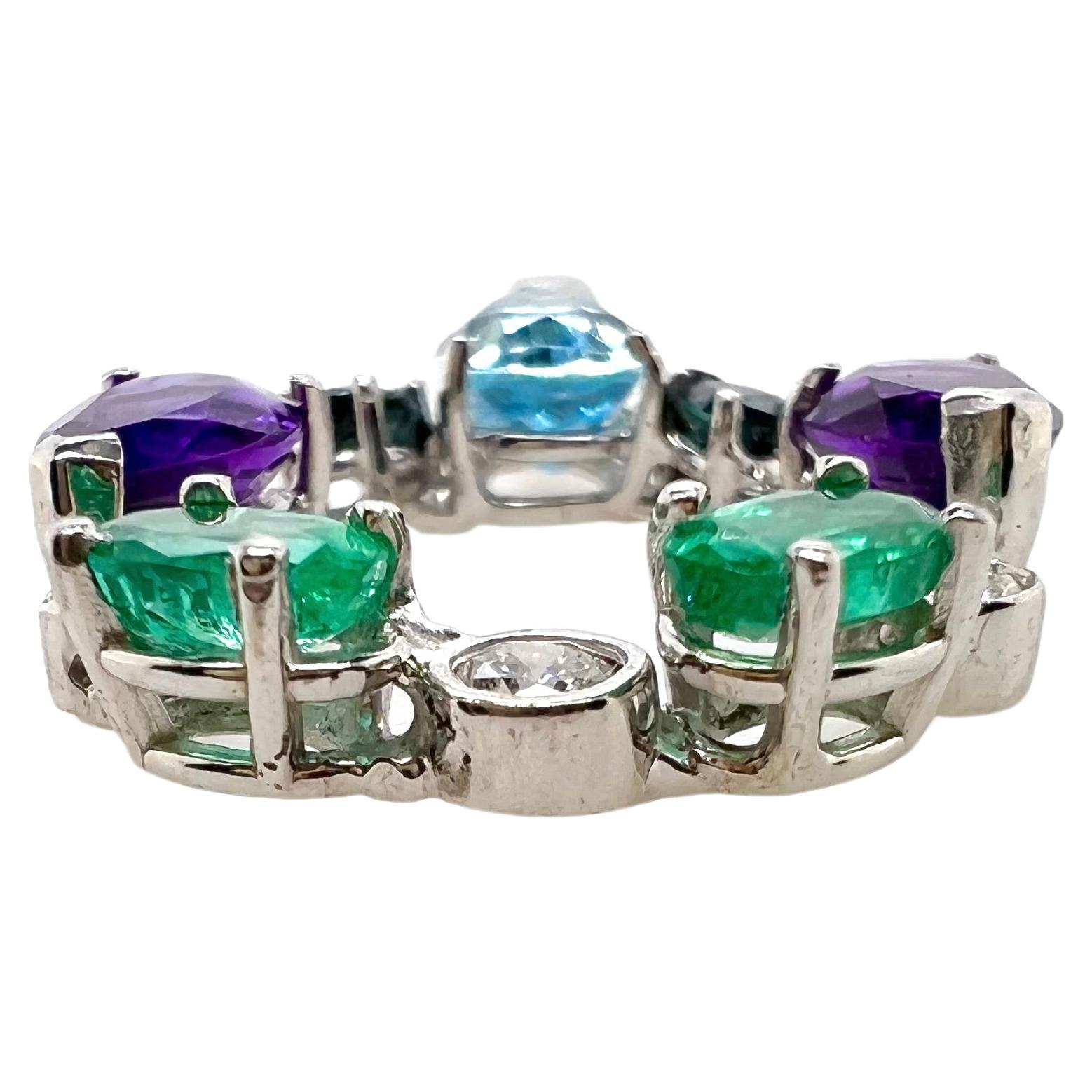 This unique circular shaped pendant is made up for a color array emeralds, amethyst, diamonds, aquamarine, and sapphires.  The stones are arranged to give a beautiful circular motif pendant that will grasp everyone's attention!


Miscellaneous