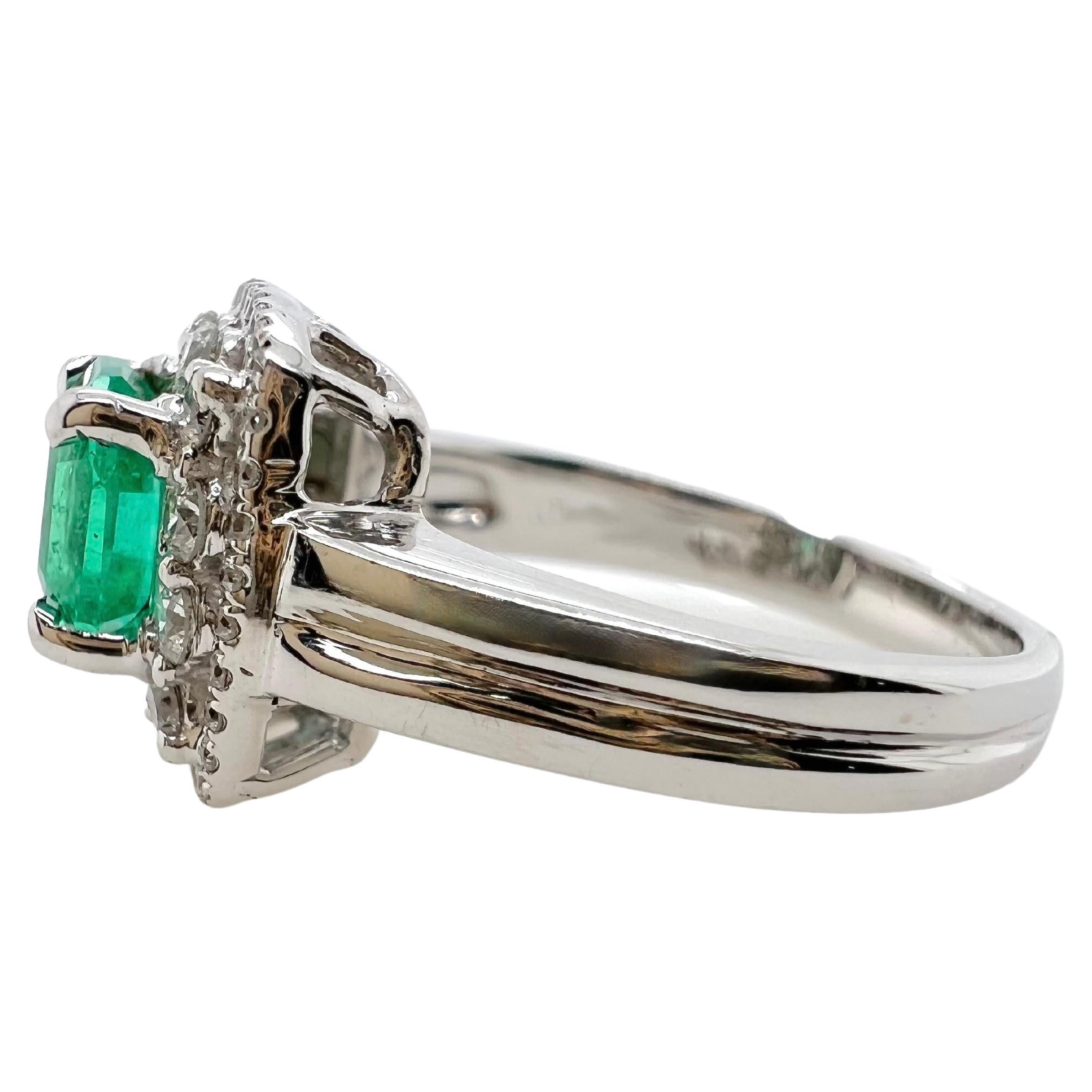 This beautiful emerald ring is set in 14k white gold mounting with diamonds.  The emerald is surrounded by a double halo diamond setting that gives a gorgeous look!


Size: 5.75
Stone: Emerald 0.86 ct
Diamonds: 0.44 ct total weight 
Metal: 14k White