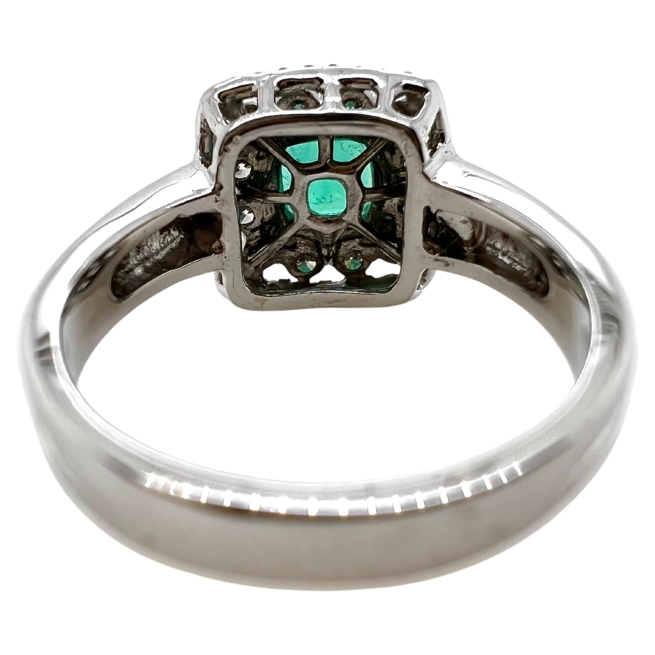 Contemporary 14k White Gold Emerald and Diamond Ring