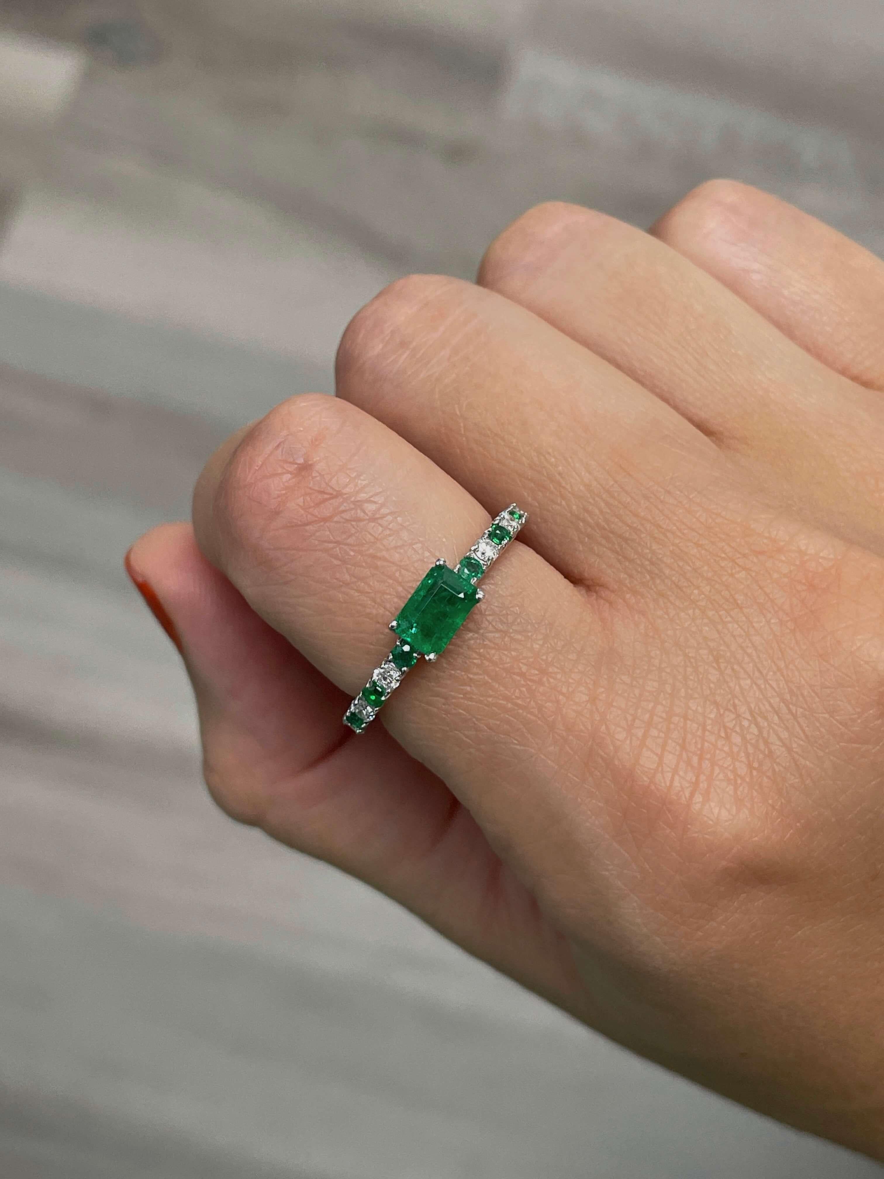 Add a pop of color to your everyday wardrobe with this emerald and diamond ring featuring a beautiful emerald center stone and alternating round diamonds and emeralds. Also available in Yellow Gold.

14K Gold Emerald and Diamond Ring
6 x 4 Center