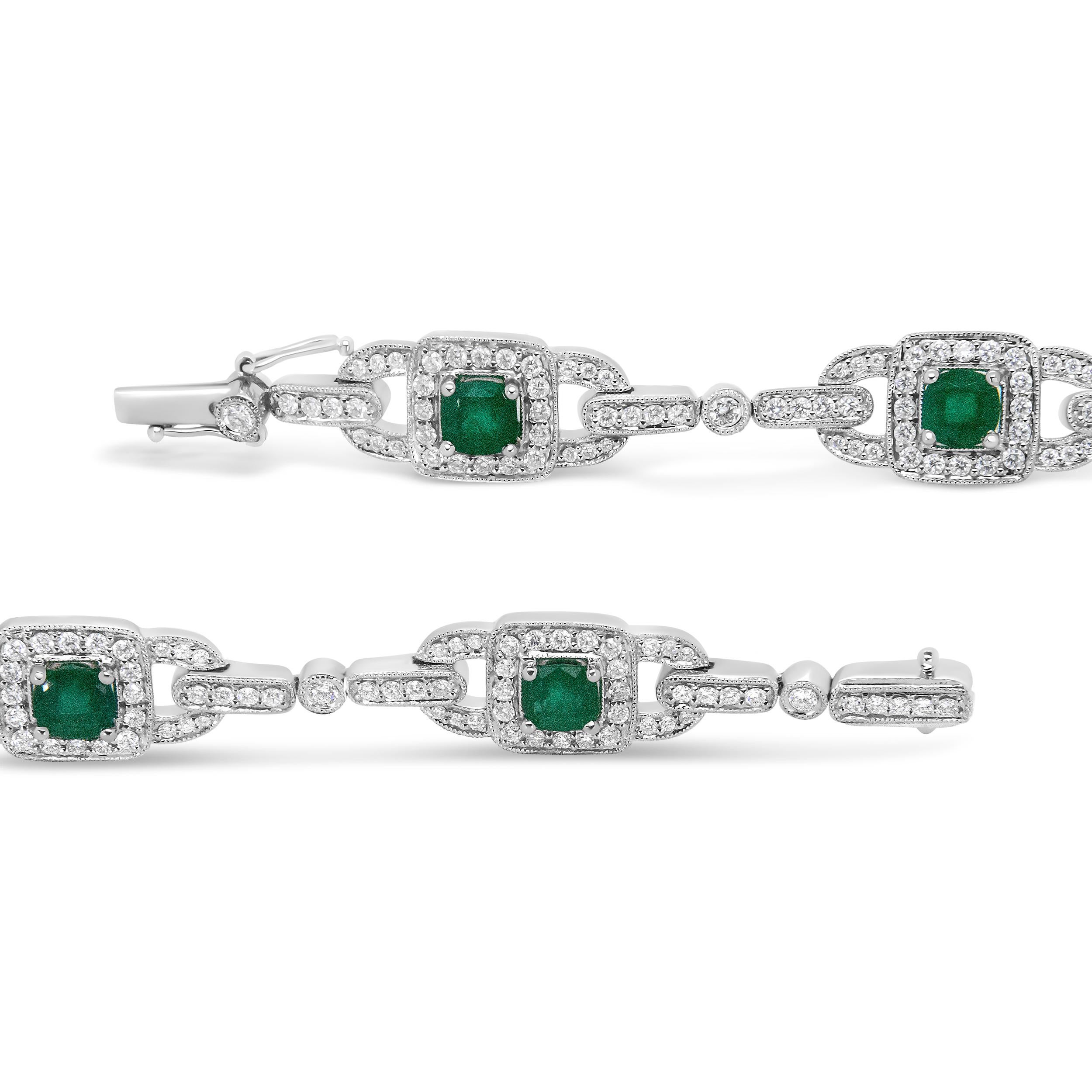 This shimmering women's link bracelet features diamond-encrusted links of 14k white gold alongside faceted 5mm cushion cut emeralds. Each prong-set emerald gemstone is haloed by round, prong-set diamonds in a sophisticate pattern linked by single