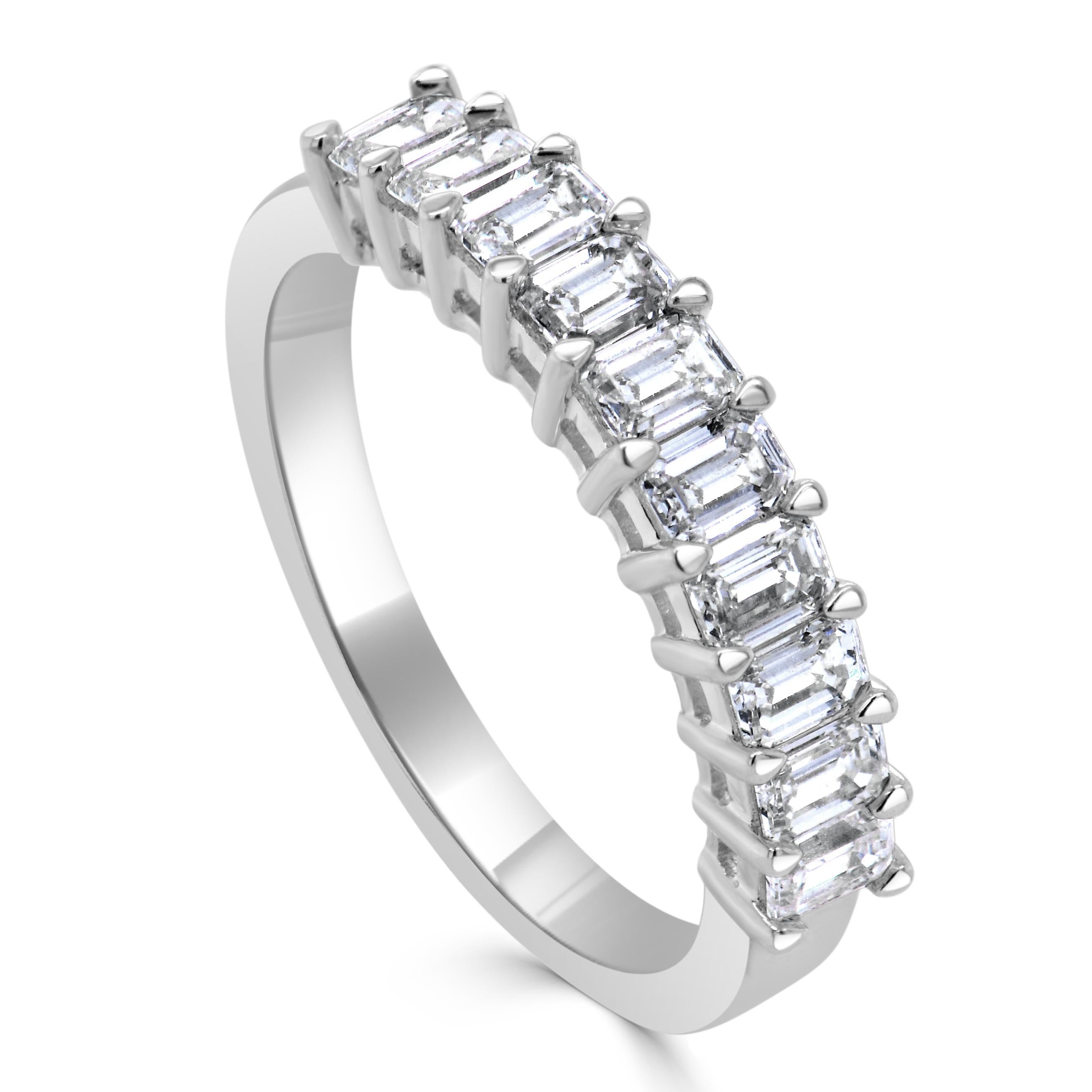 This Elegant and Charming half way around Band crafted of 14K Gold features 10 Emerald Cut Diamonds weighing 0.99cts, Diamond Color & Clarity is GH-SI1. This Ring can be sized one size up or down by your Jeweler. Size 7
 
 14K Gold
 10 Emerald Cut